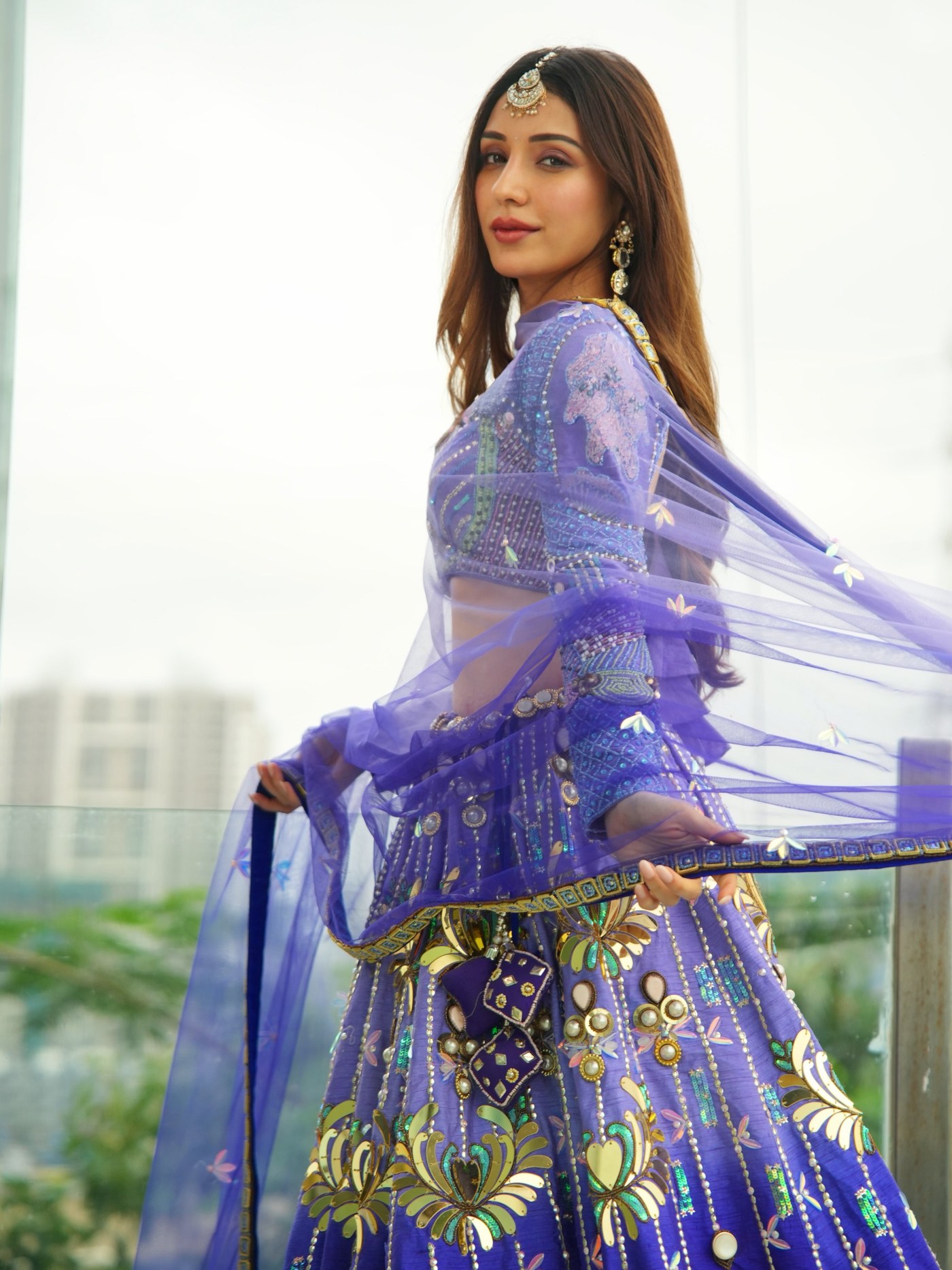 Heli Daruwala Redefines Indian Couture with Regal Purple Elegance