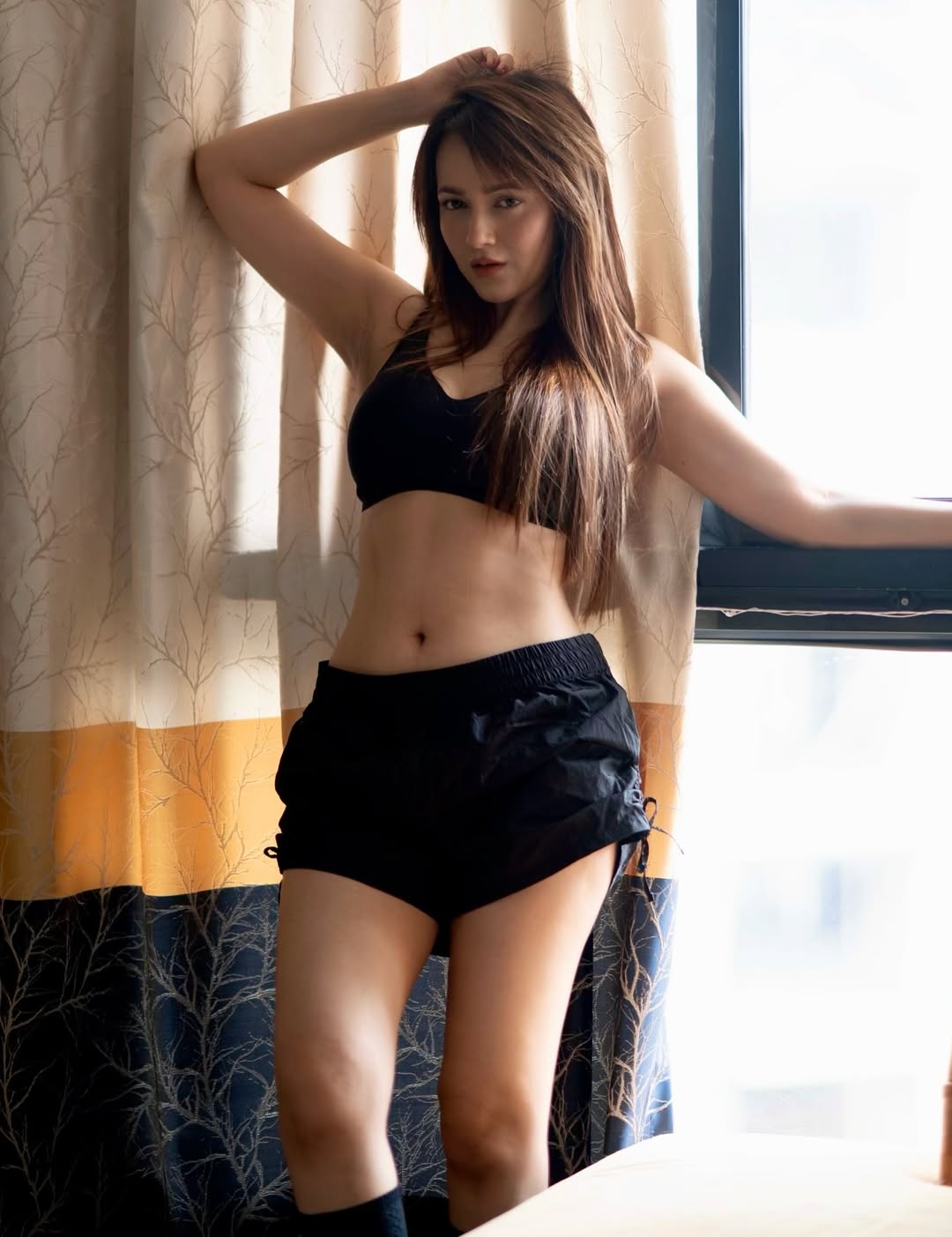 Himani Sharma's Bold Athleisure Style Black Glamour