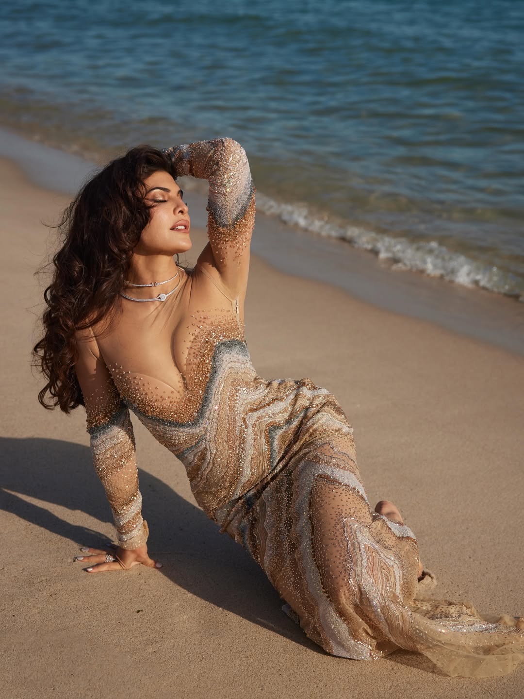 Jacqueline Fernandez's Golden Beach Glamour