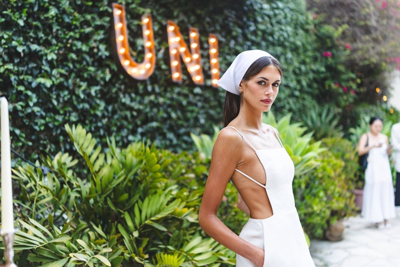 Kaia Gerber is seen looking glamorous and stylish while attending a major summer university party in Los Angeles.