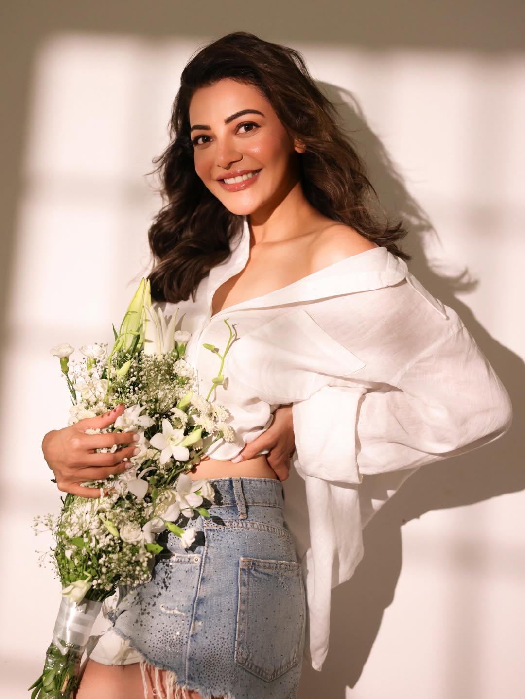 Kajal Aggarwal's Ethereal Beauty in White Blooms