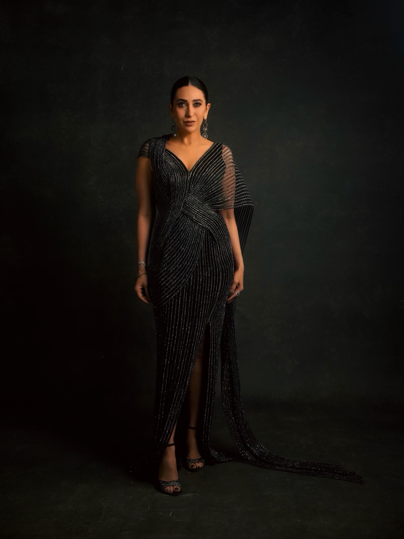 Midnight Dressing: Karisma Kapoor's Shimmering Black Drape