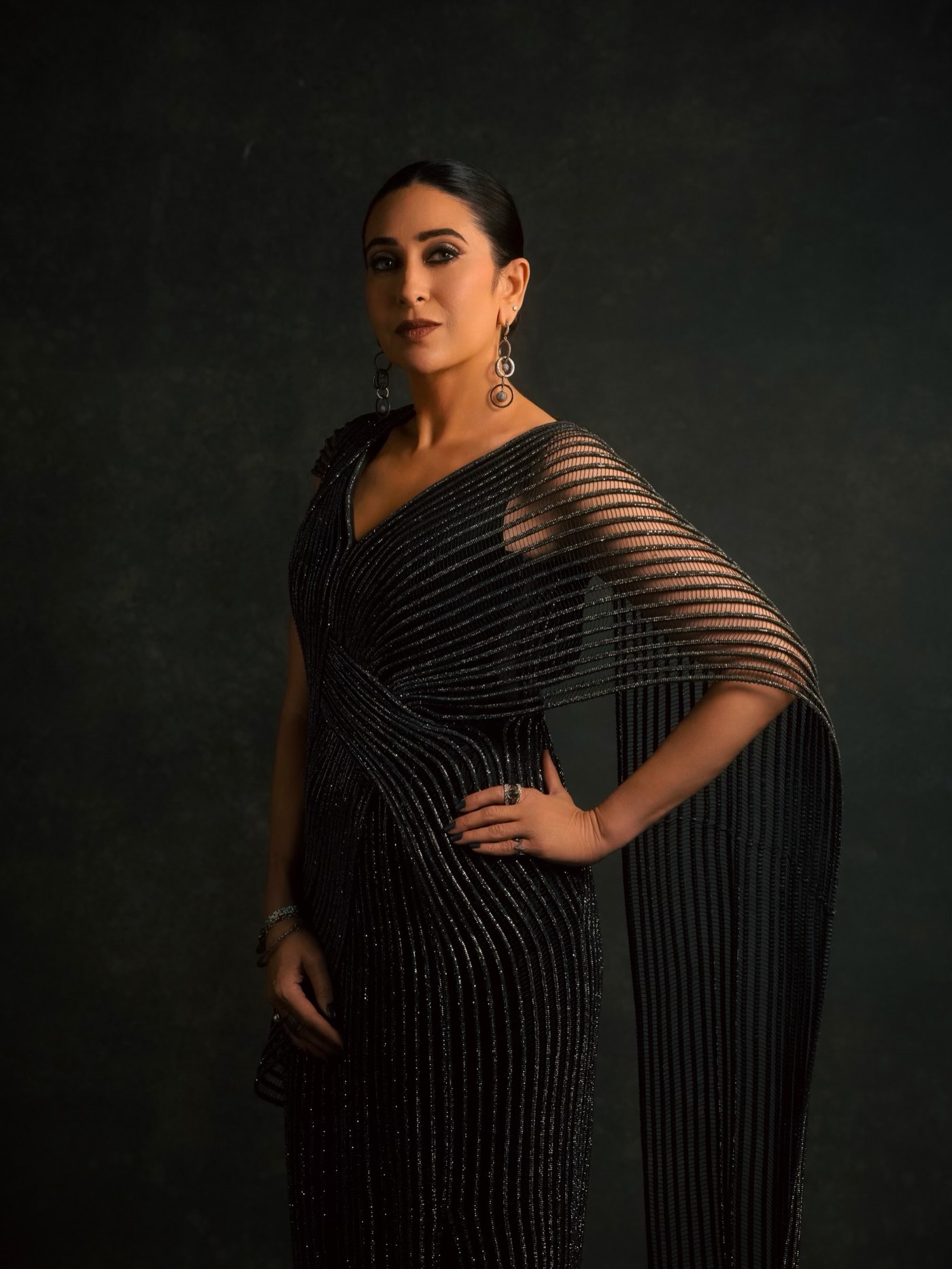 Midnight Dressing: Karisma Kapoor's Shimmering Black Drape