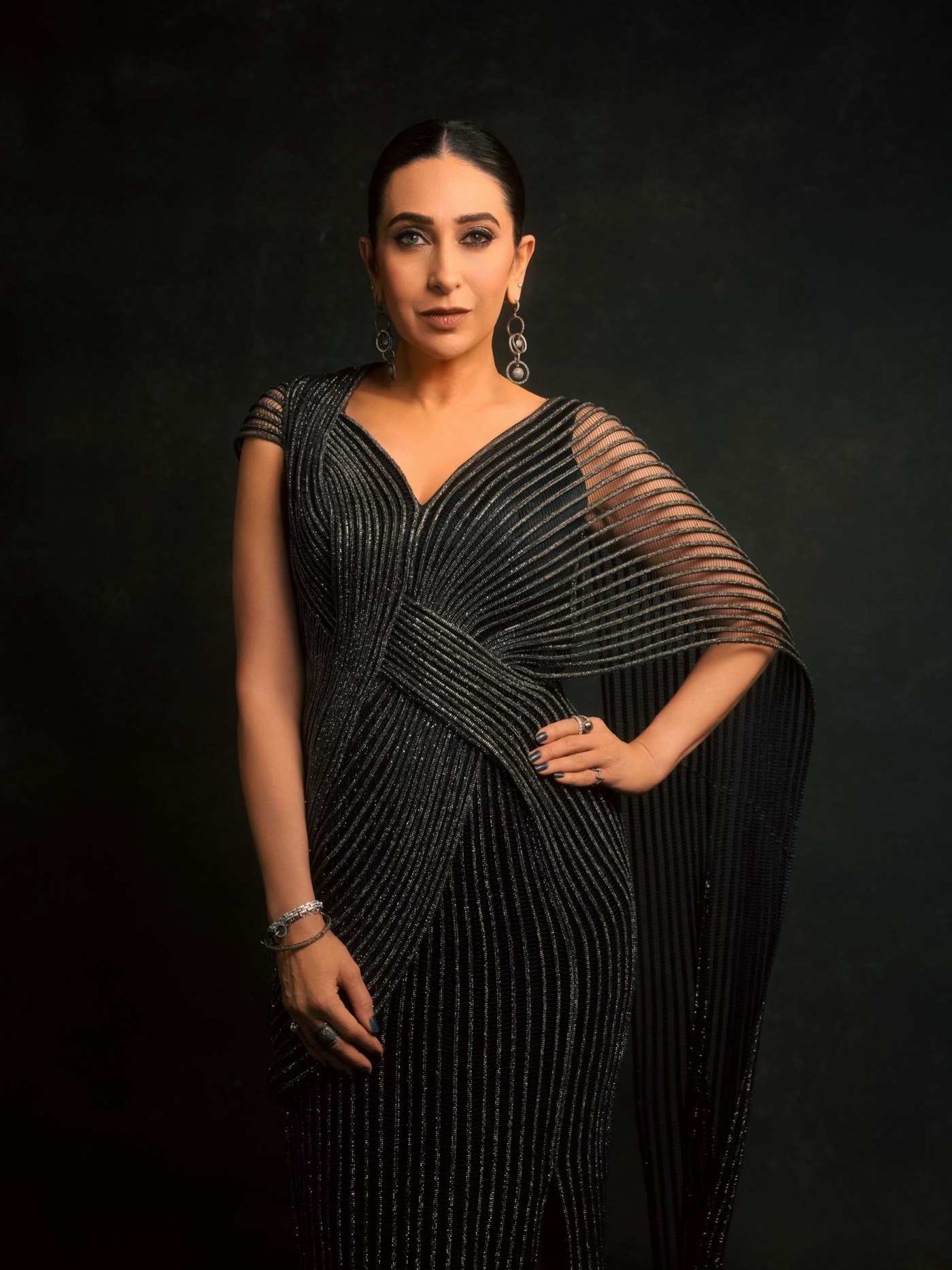 Midnight Dressing: Karisma Kapoor's Shimmering Black Drape