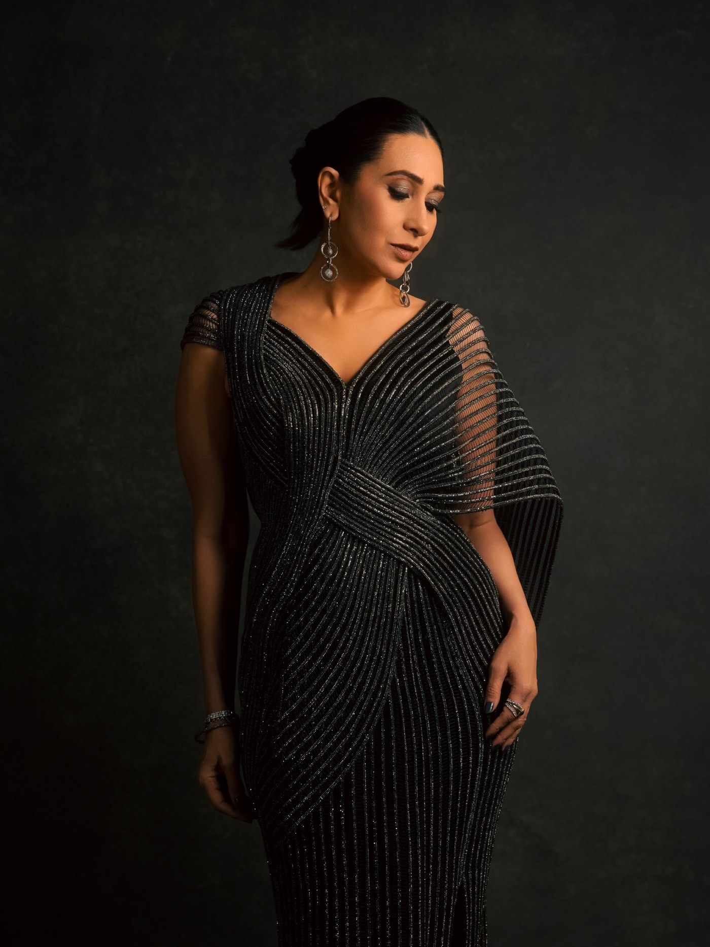 Midnight Dressing: Karisma Kapoor's Shimmering Black Drape