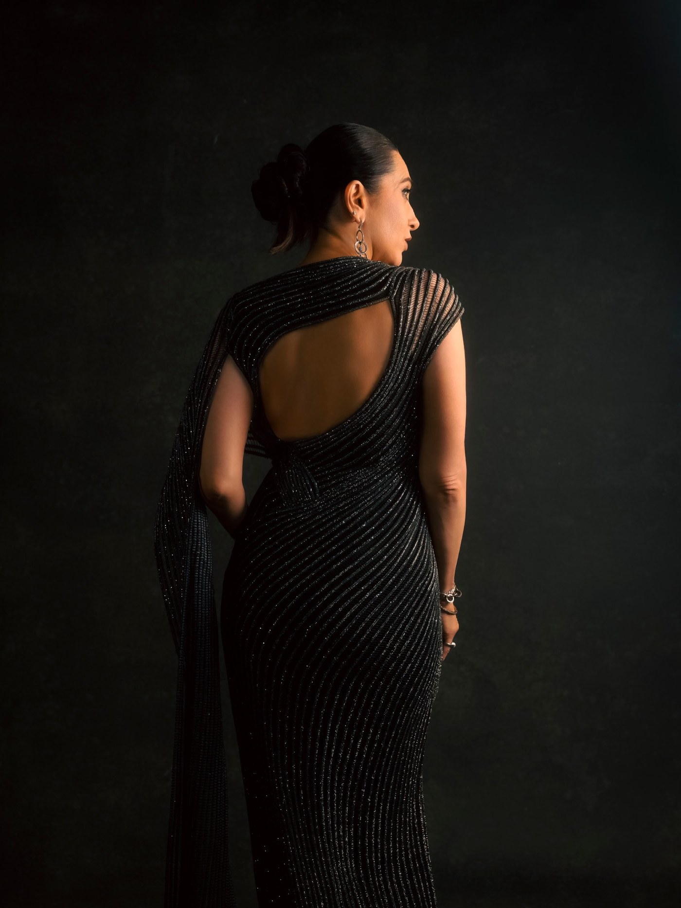Midnight Dressing: Karisma Kapoor's Shimmering Black Drape