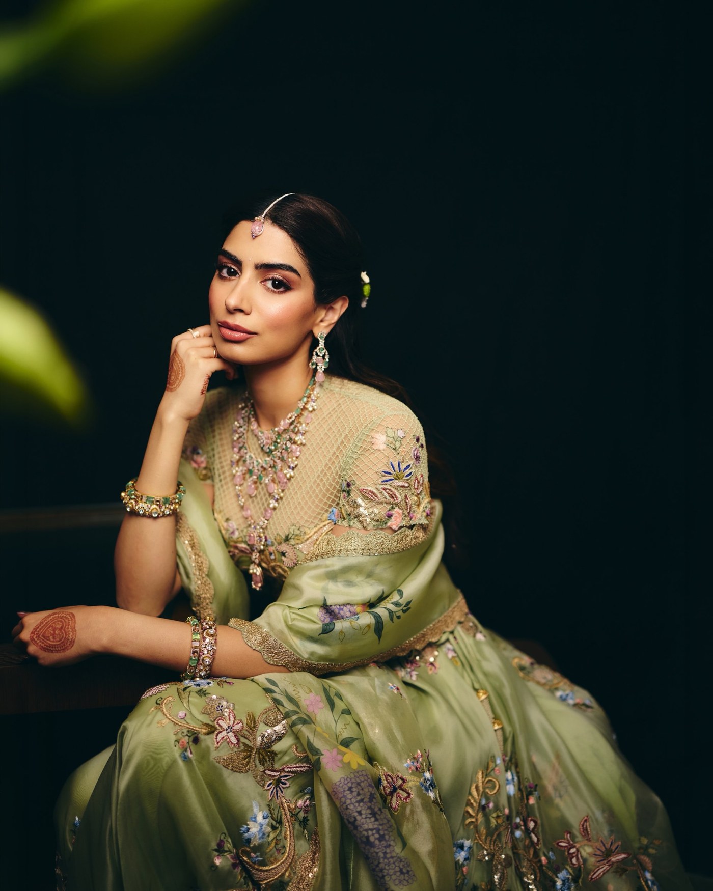 Khushi Kapoor radiates elegance in a breathtaking pastel green lehenga at a high-profile Mumbai wedding.