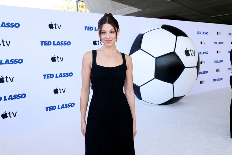 Kira Kosarin is seen attending a premiere event, radiating elegance on the red carpet. - Photos & Updates