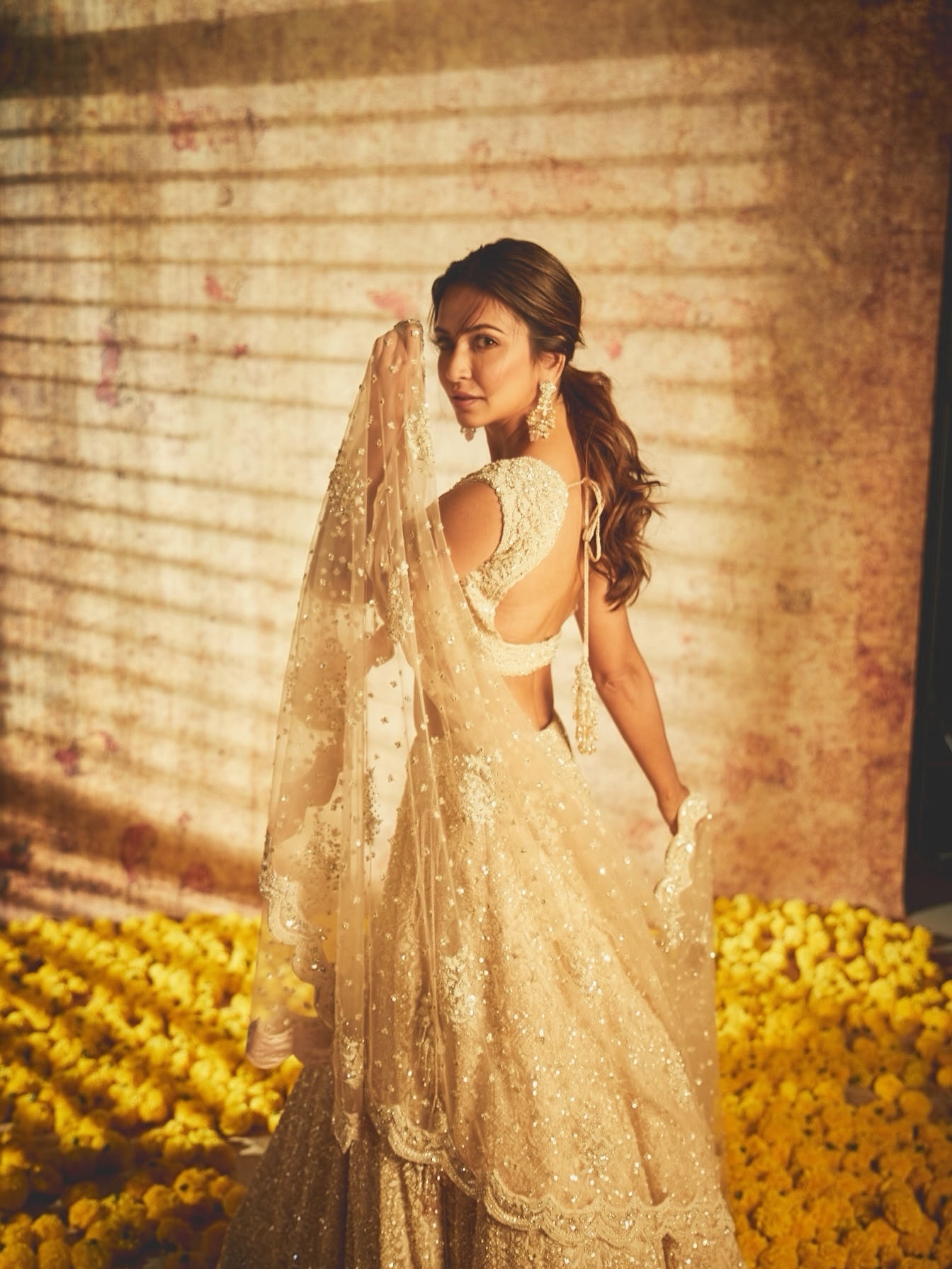 Kriti Kharbanda's Ivory-Gold Lehenga: A Study in Subtlety