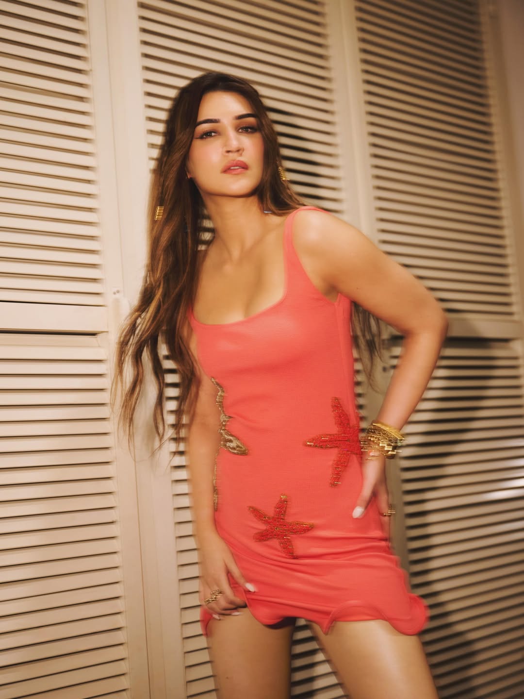 Kriti Sanon’s Chic Style Journey: From Denim Dreams to Coral Glamour