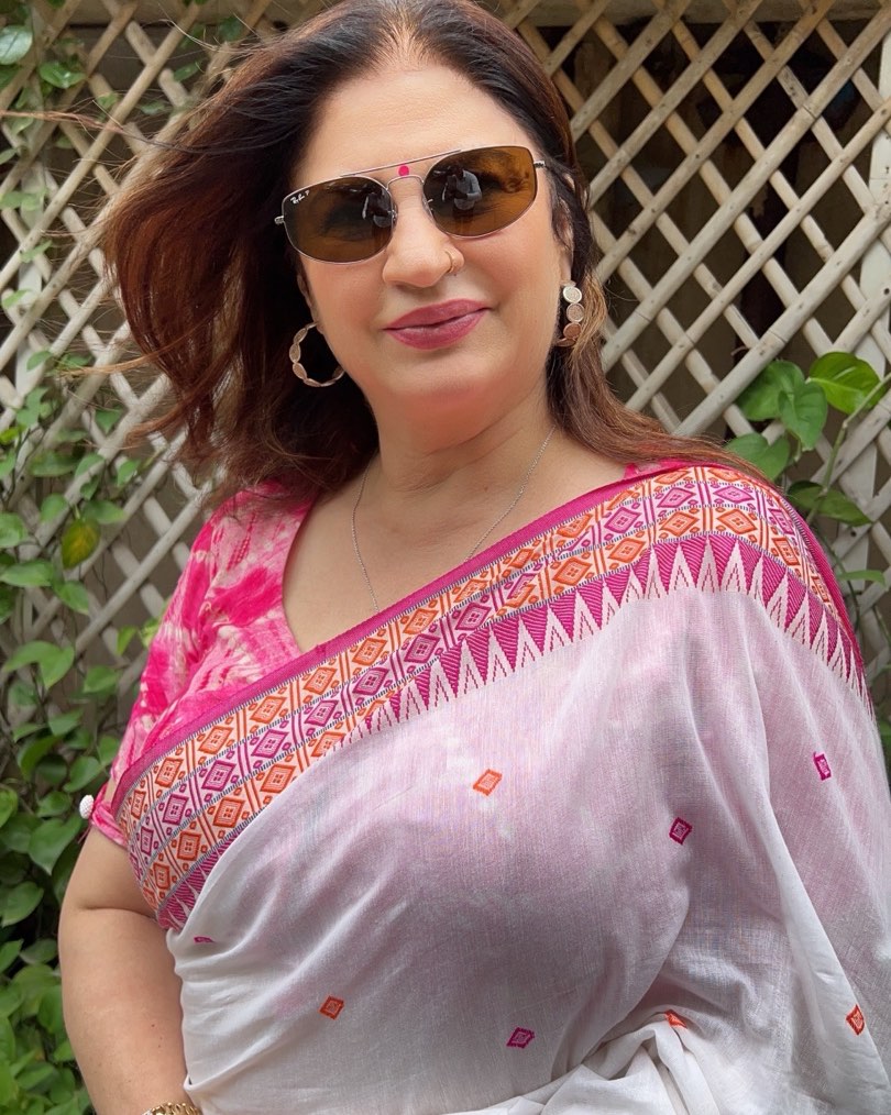 Kunickaa Sadanand is captured posing beautifully with a striking smile and vibrant outfit.