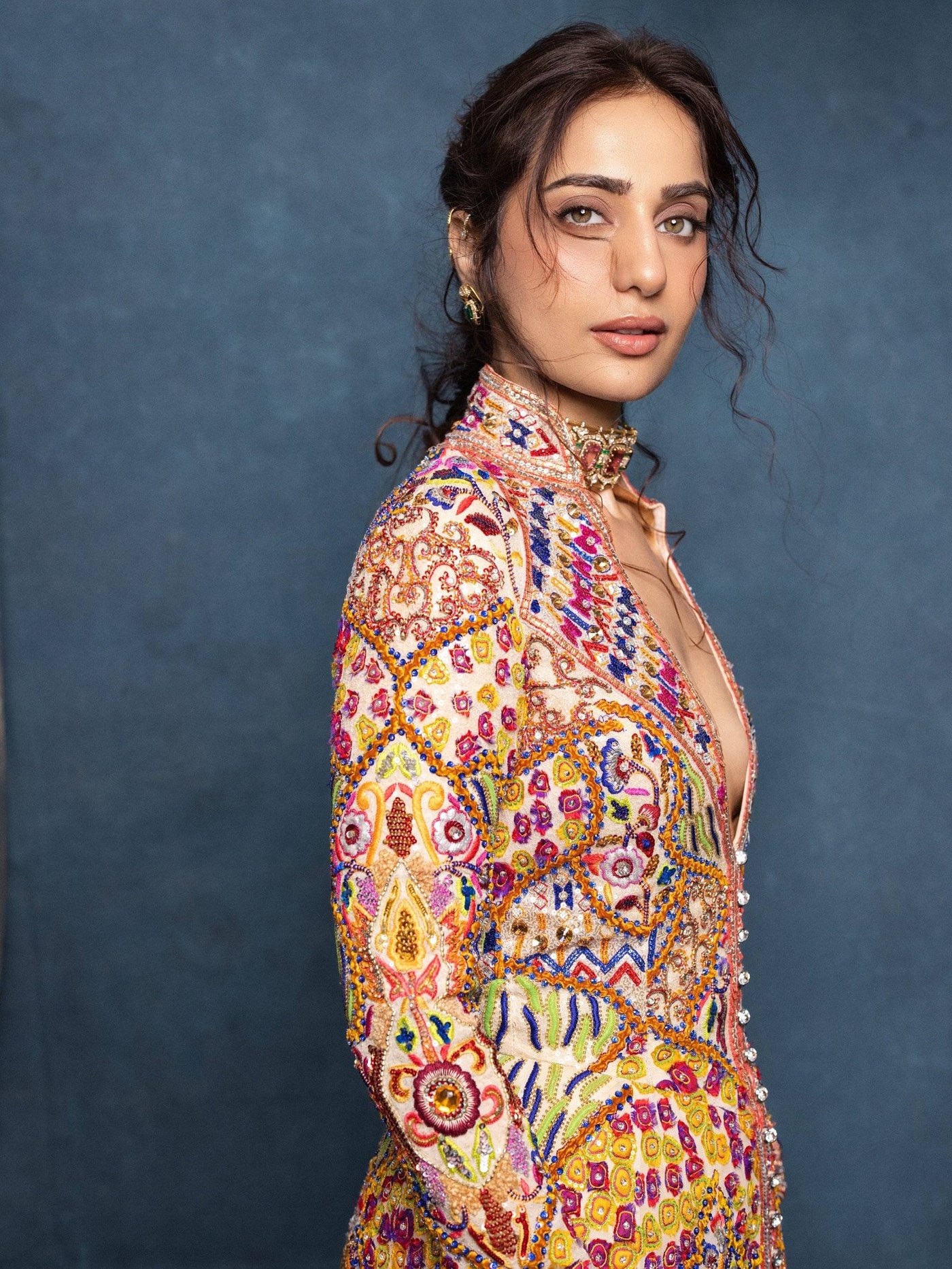 Kusha Kapila radiates confidence in a bold and dramatic fashion ensemble, showcasing a vibrant personal style.