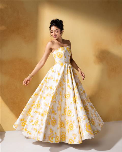 Preity Mukhundhan showcases a captivating pose and elegant style during a recent glamour photoshoot.