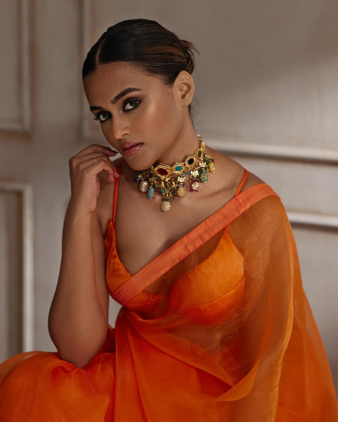 Kyraa Vasudevan's Vibrant Red & Gold Ensemble