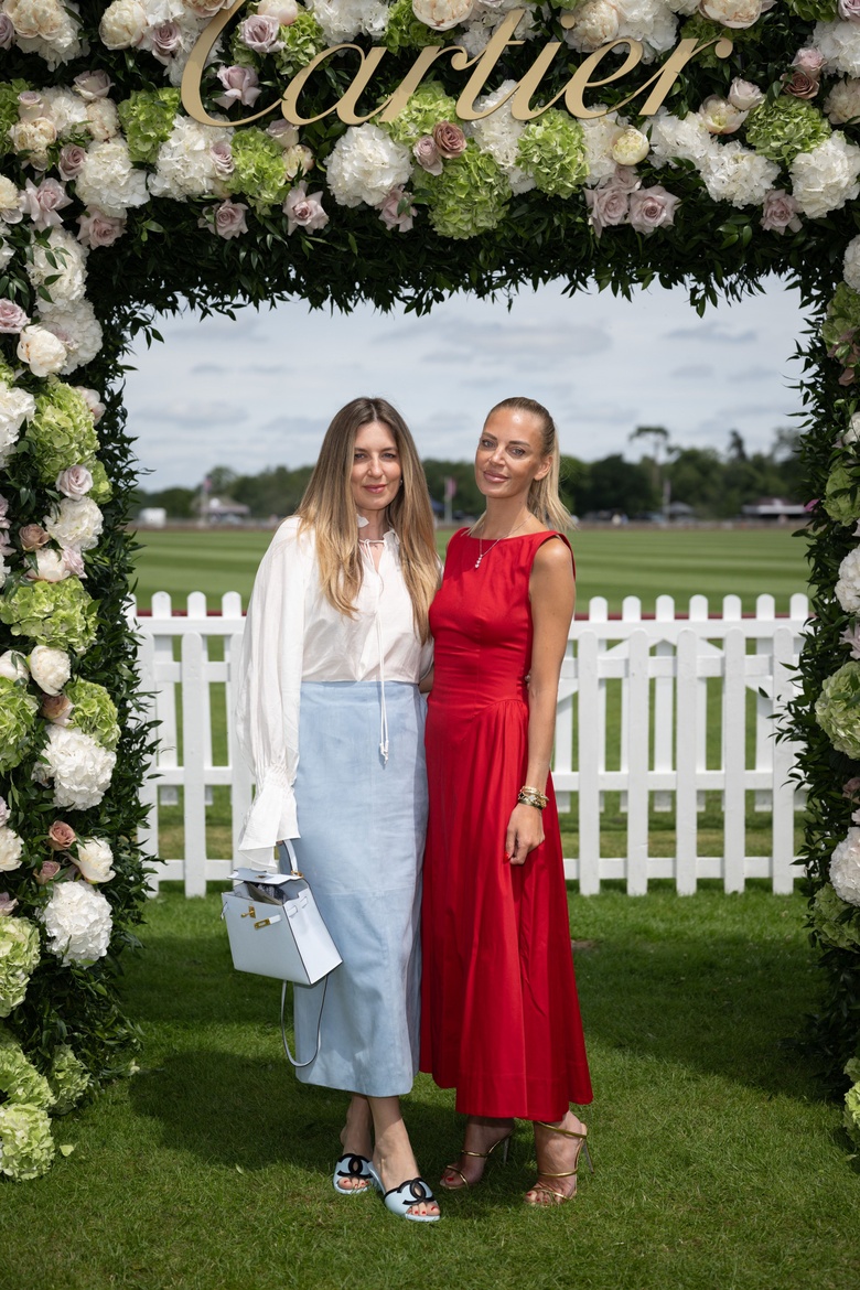 Laura Willis is pictured attending the prestigious Cartier Queen's Cup Polo event at Guards Polo Club, Windsor Great Park.