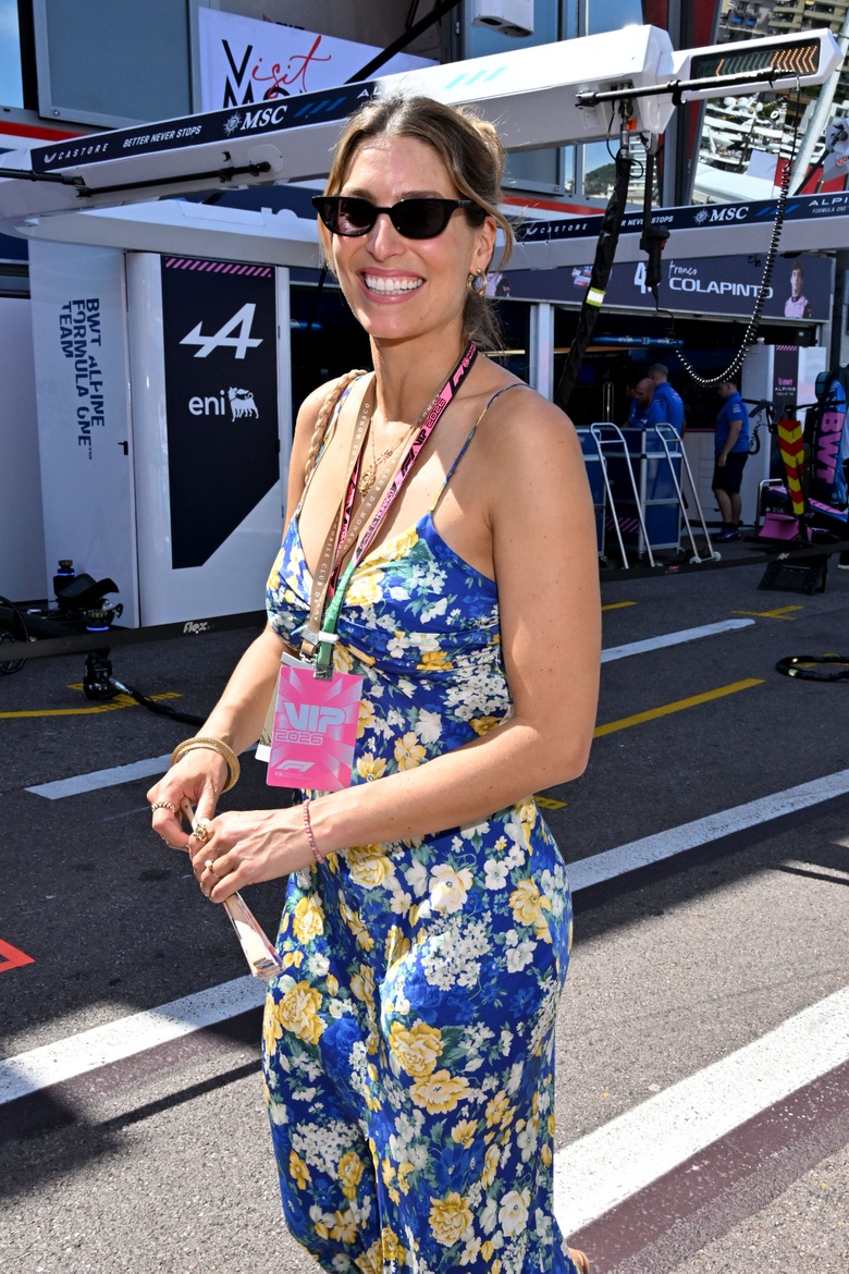 Laury Thilleman posing outdoors, showcasing a vibrant, stylish ensemble.