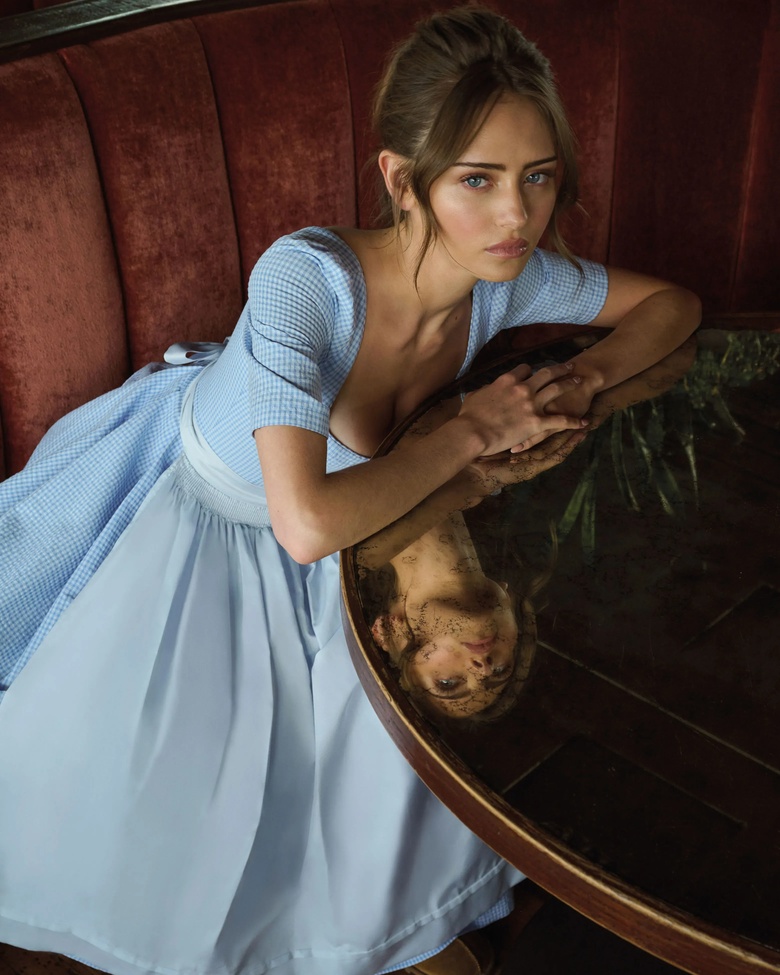 Leni Klum models an elegant Sportalm Dirndl ensemble, highlighting traditional German style.
