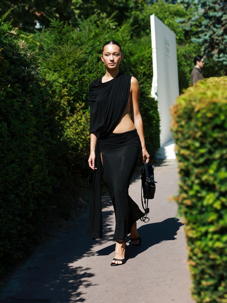 Lily Chee shines while attending a high-profile couture event, showcasing natural beauty and sophisticated style.