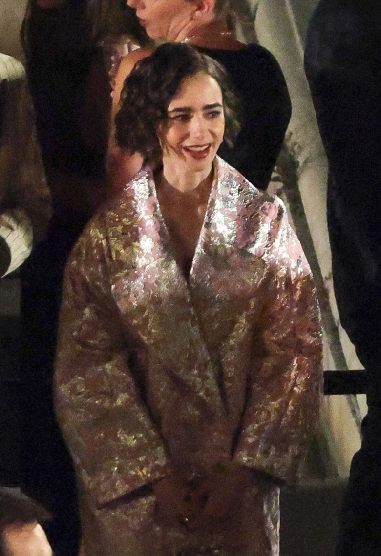 Lily Collins captures attention while filming scenes at the Palais Royal in Paris.