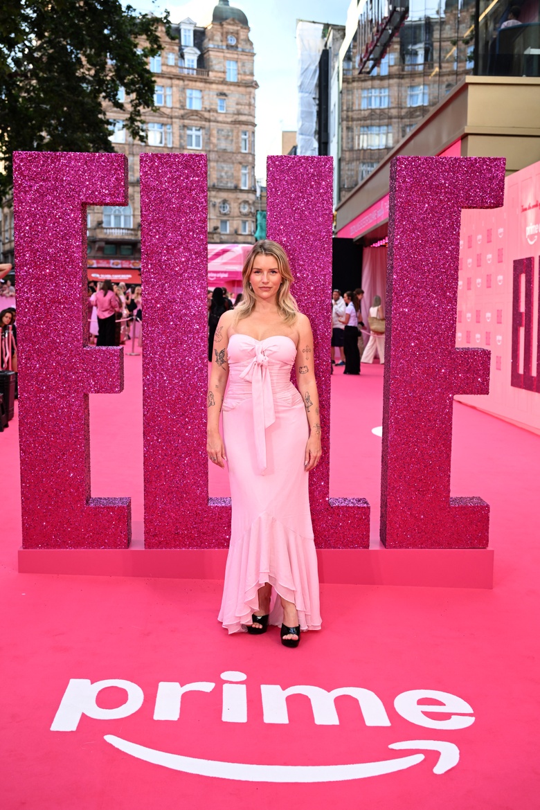Lottie Moss arrives at an elegant London event, radiating natural beauty and sophisticated style.