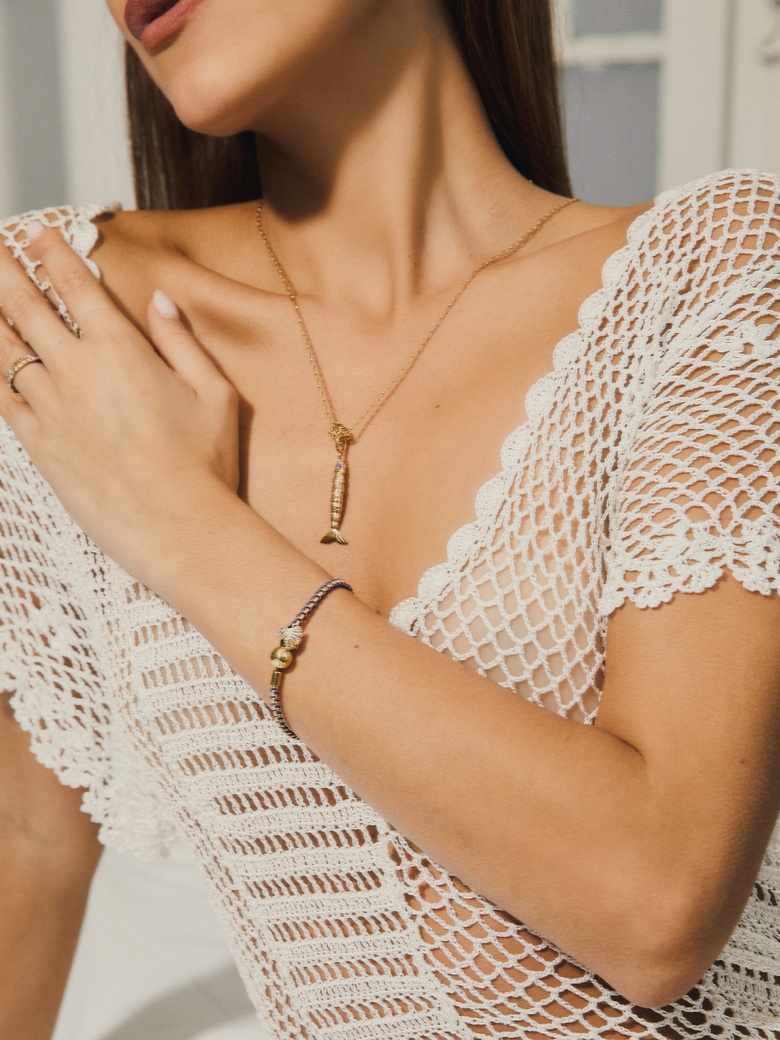 Luana Barron shines in a beautiful, elegant white dress while attending the Pandora jewelry event.