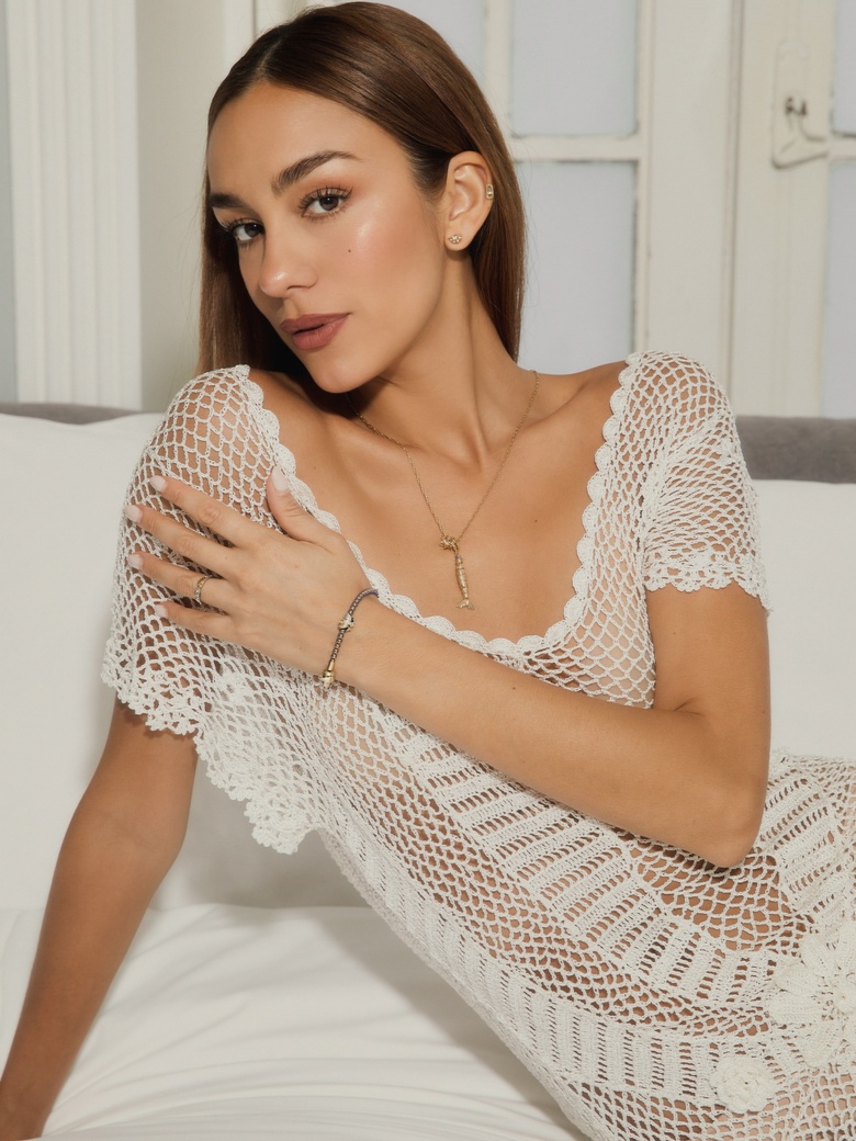 Luana Barron Radiates Elegance in Stunning White Ensemble at Pandora Event