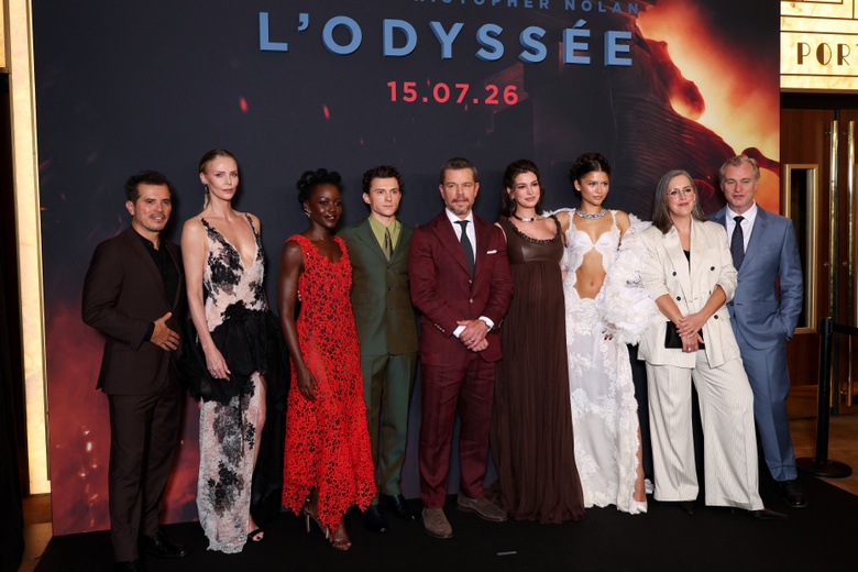 Lupita Nyongo Lights Up the Red Carpet in a Stunning Coral Lace Masterpiece
