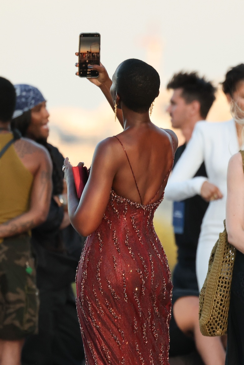 Lupita Nyongo Radiates Elegance at Christopher Nolan’s Epic Paris Event