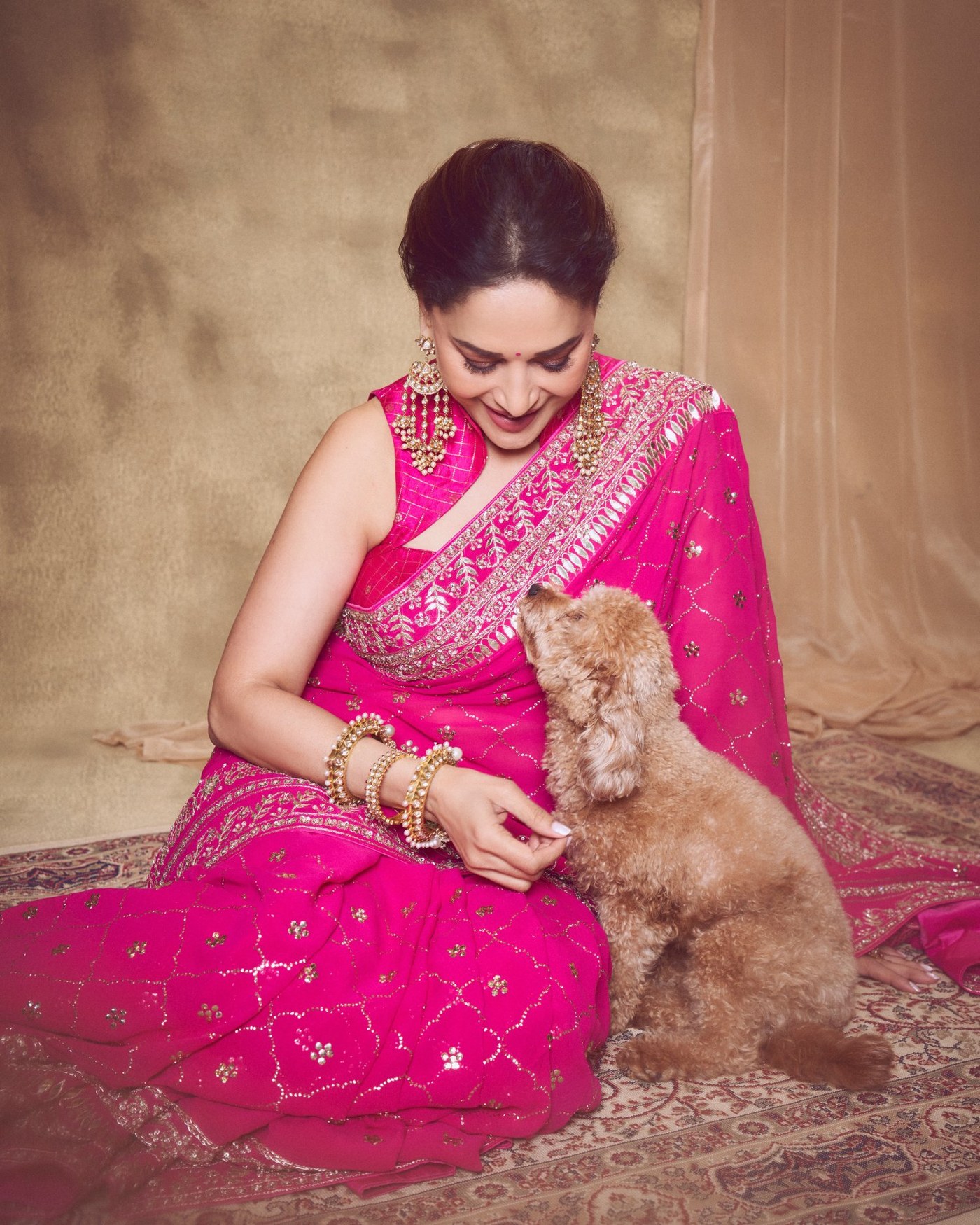 Madhuri Dixit's Timeless Pink Saree Glow: An Ode to Bollywood Elegance!
