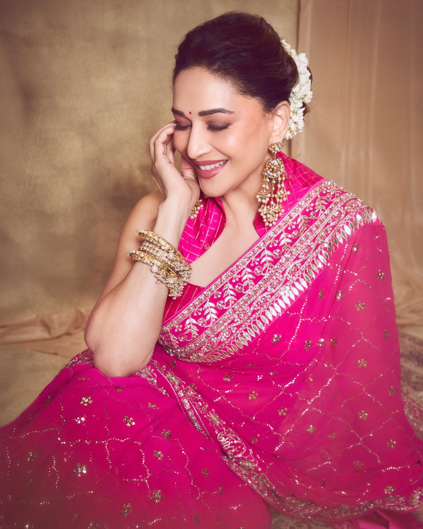 Madhuri Dixit's Timeless Pink Saree Glow: An Ode to Bollywood Elegance!