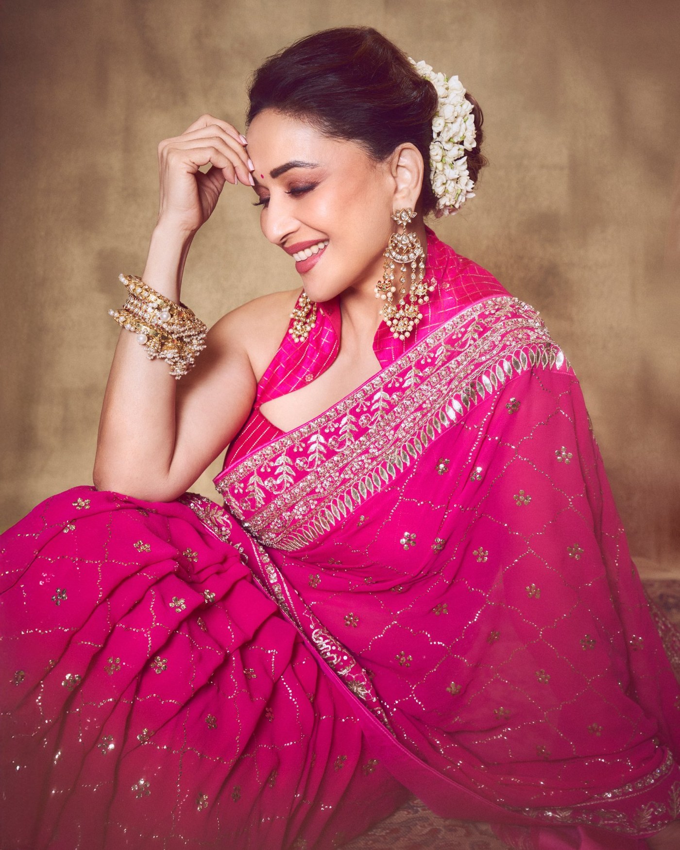 Madhuri Dixit's Timeless Pink Saree Glow: An Ode to Bollywood Elegance!