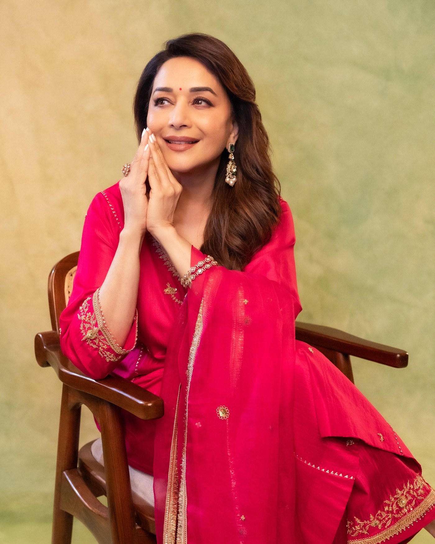 Madhuri Dixit’s Golden Glow: Effortless Elegance in Pink Perfection