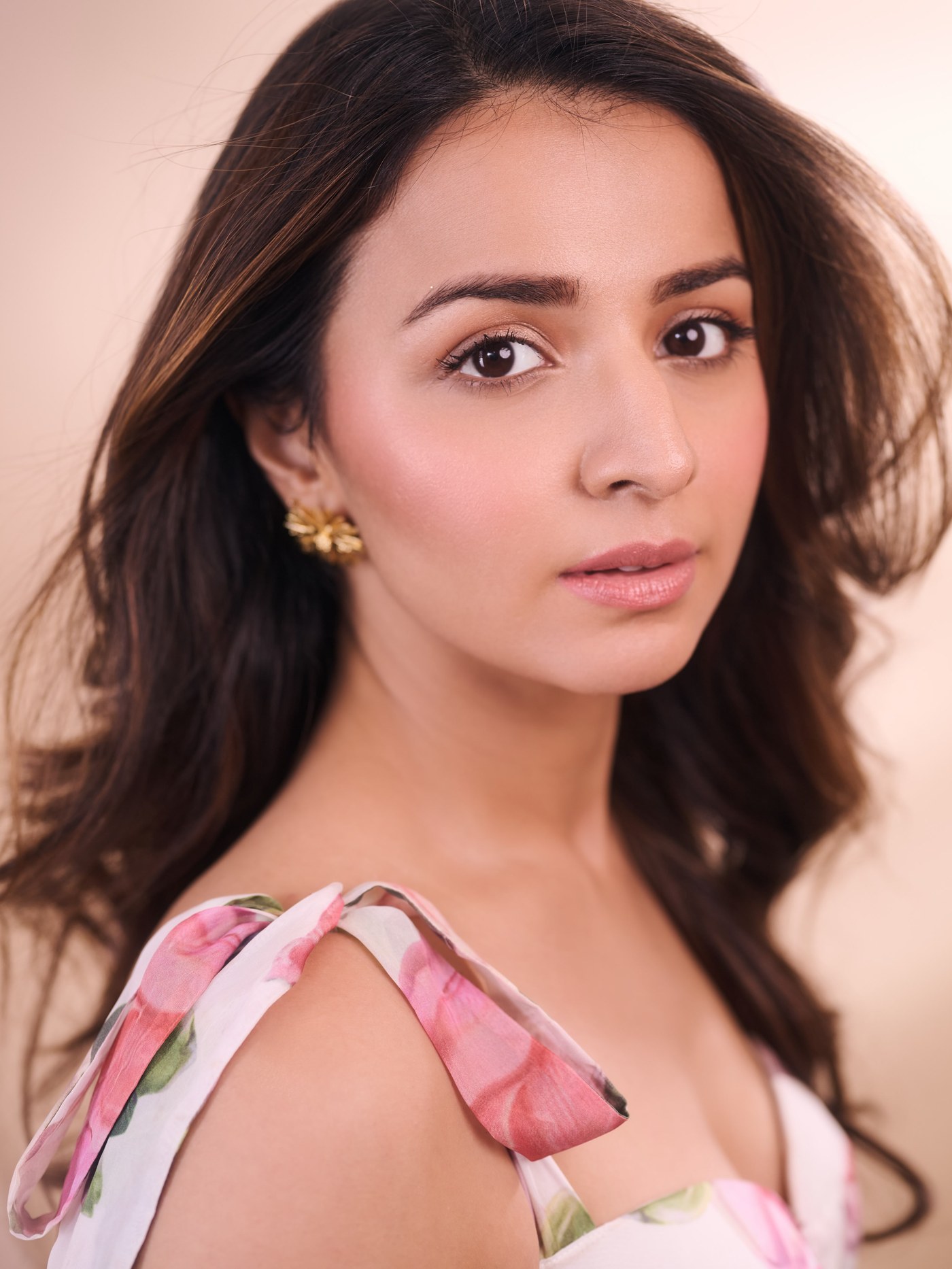 Mahima Makwana showcases a beautiful floral-printed white maxi dress in an effortlessly graceful ensemble.