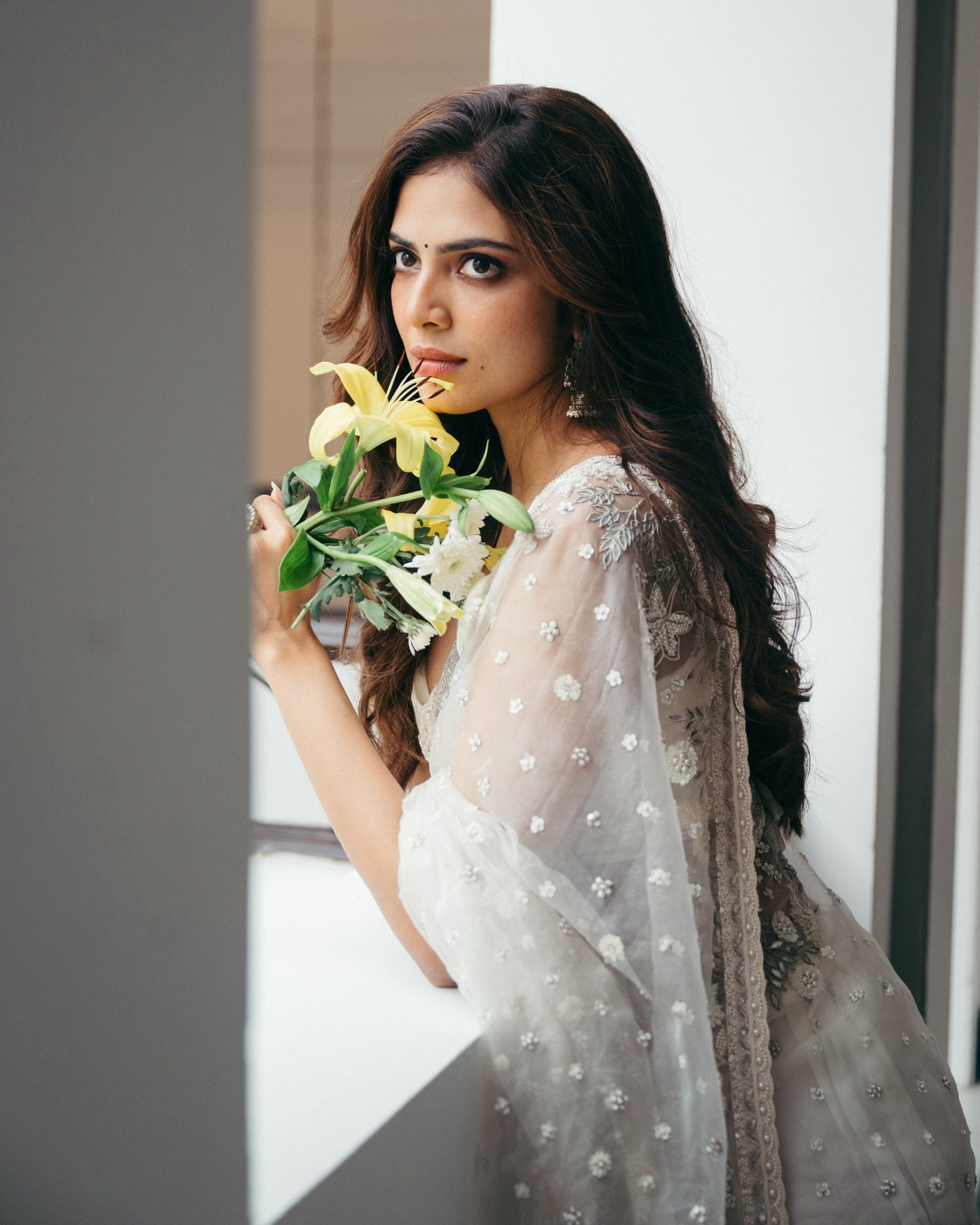 Malavika Mohanan's Effortless Mastery in a Sheer Saree
