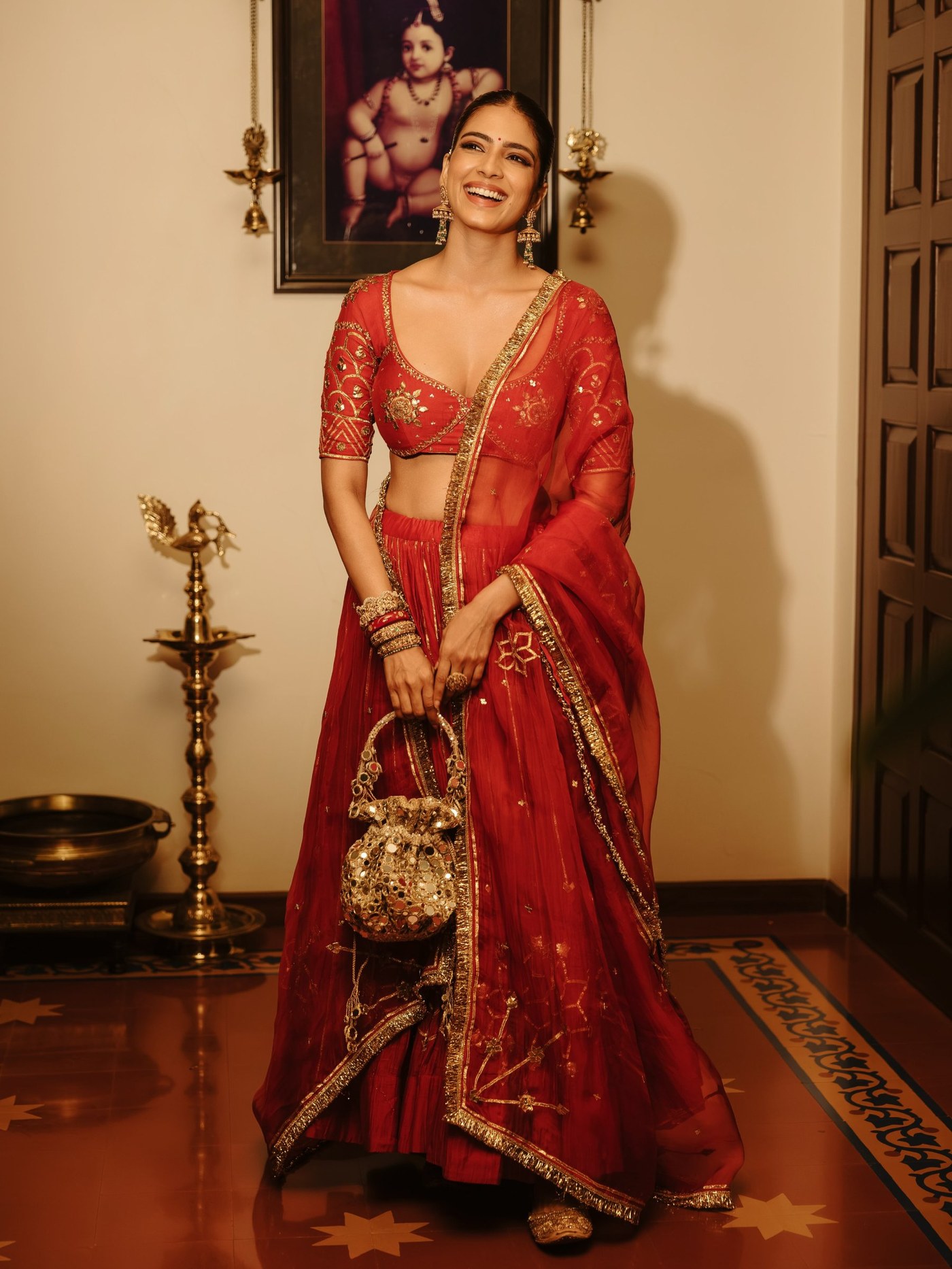 Red Lehenga Detail: Malavika's Festive Ensemble Analysis