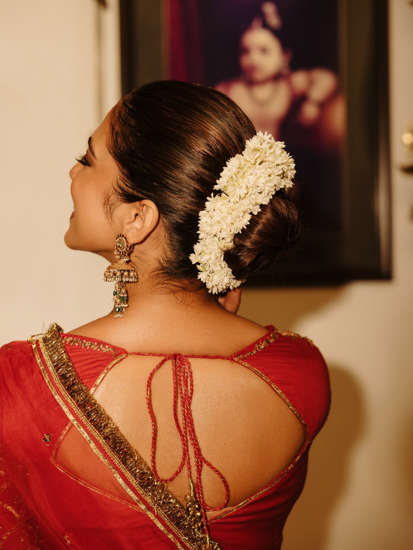 Red Lehenga Detail: Malavika's Festive Ensemble Analysis