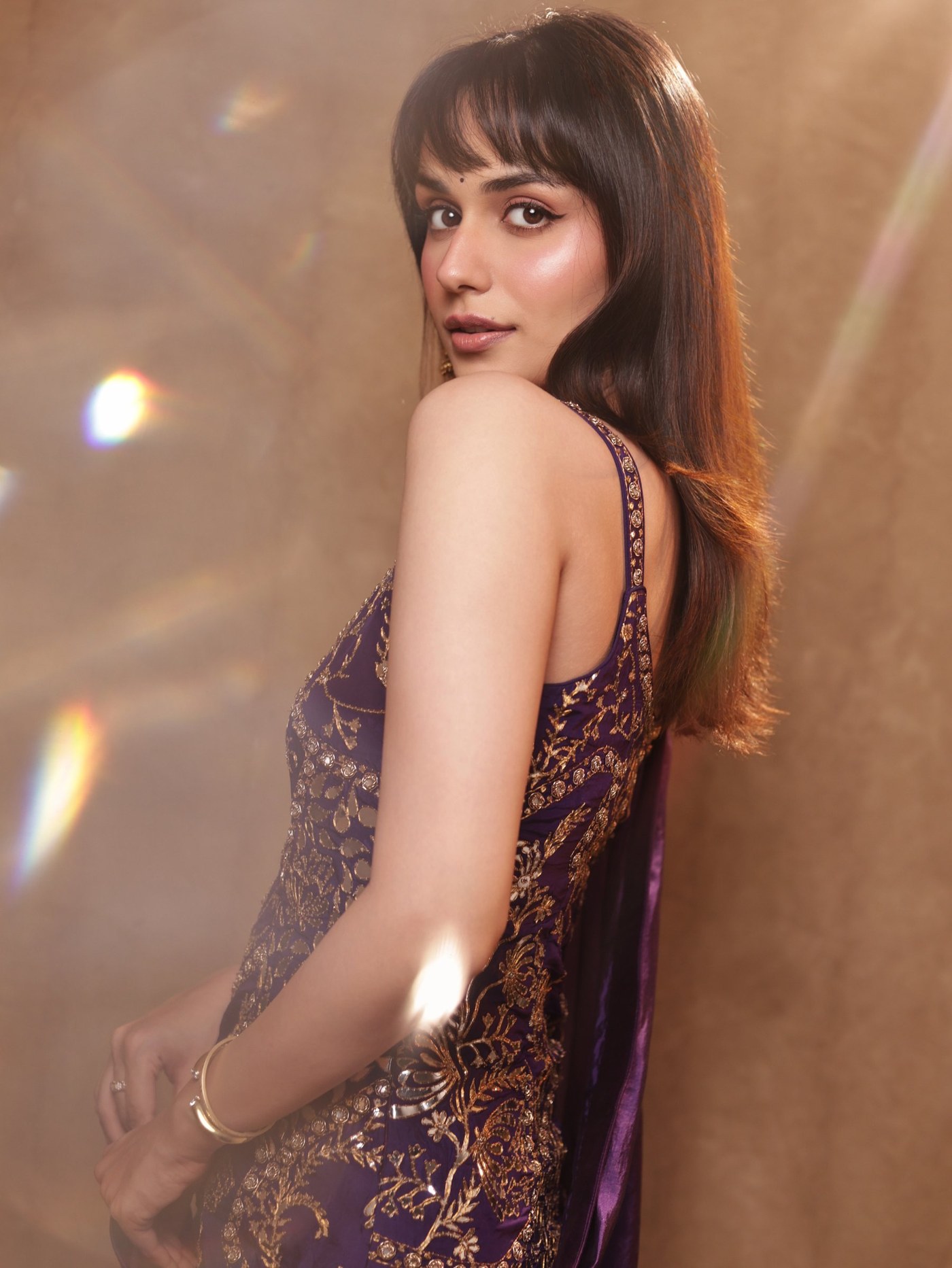 Manushi Chhillar in a deep violet and gold occasionwear ensemble. - Photos & Updates