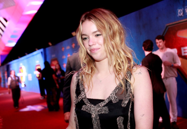 Milly Alcock Captivates with Stunning Red Carpet Glamour
