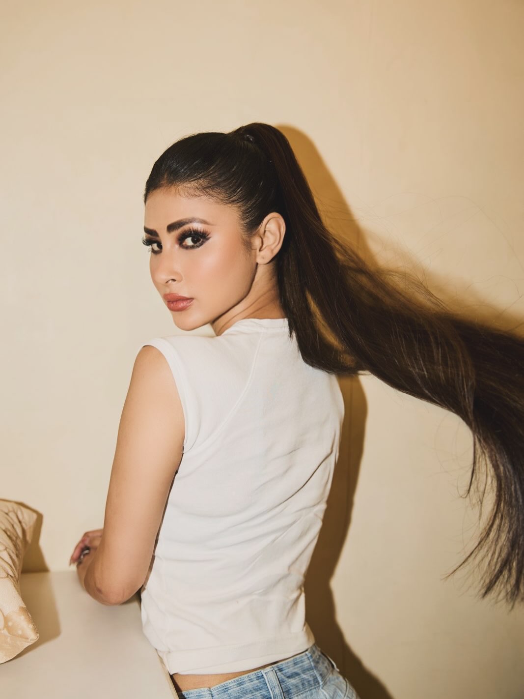 Denim Reimagined: Mouni Roy's High-Waisted White Top Look