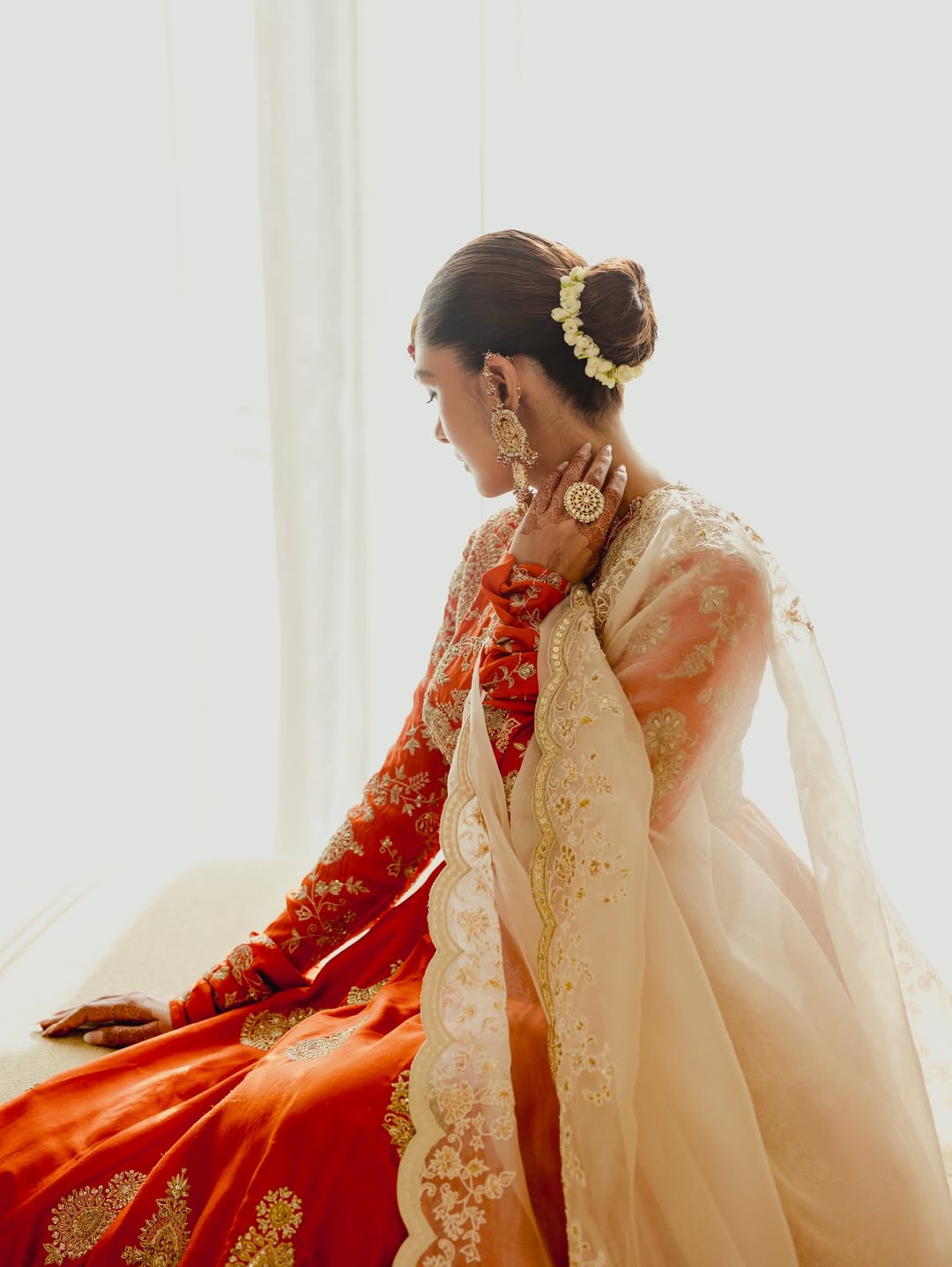 Mrunal Thakur's Regal Glow: Gold and Vermilion Splendor