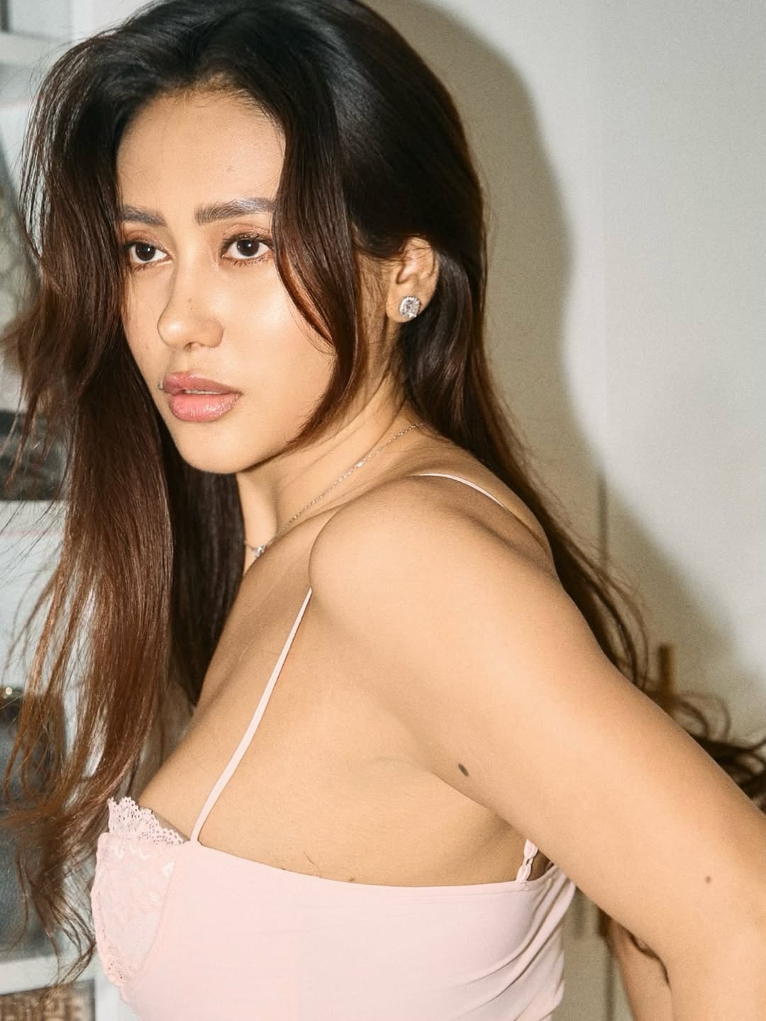 Muna Gauchan's Undone Chic Style: Viral Lace and Denim Glam