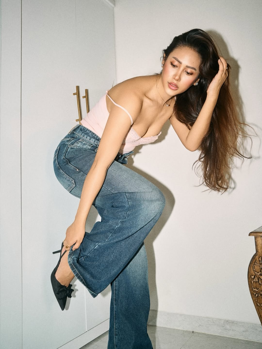 Muna Gauchan's Undone Chic Style: Viral Lace and Denim Glam
