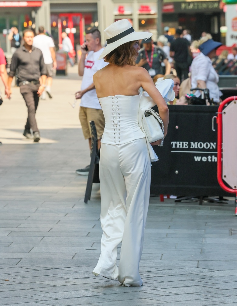 Myleene Klass is seen attending an event, showcasing a chic and sophisticated ensemble.