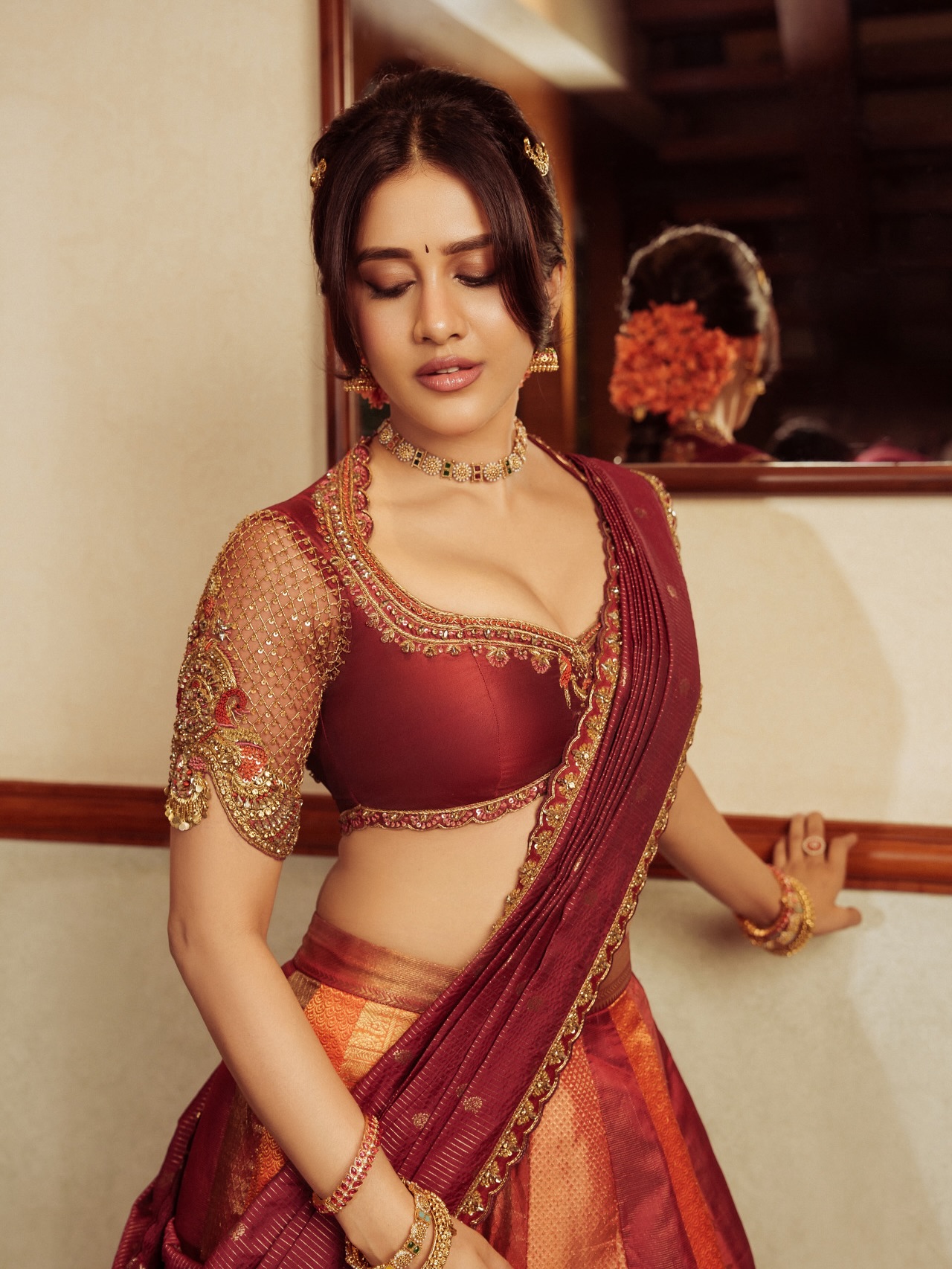 Nabha Natesh’s Regal Ethnic Glow: Mastering Festive Style with Maroon Elegance