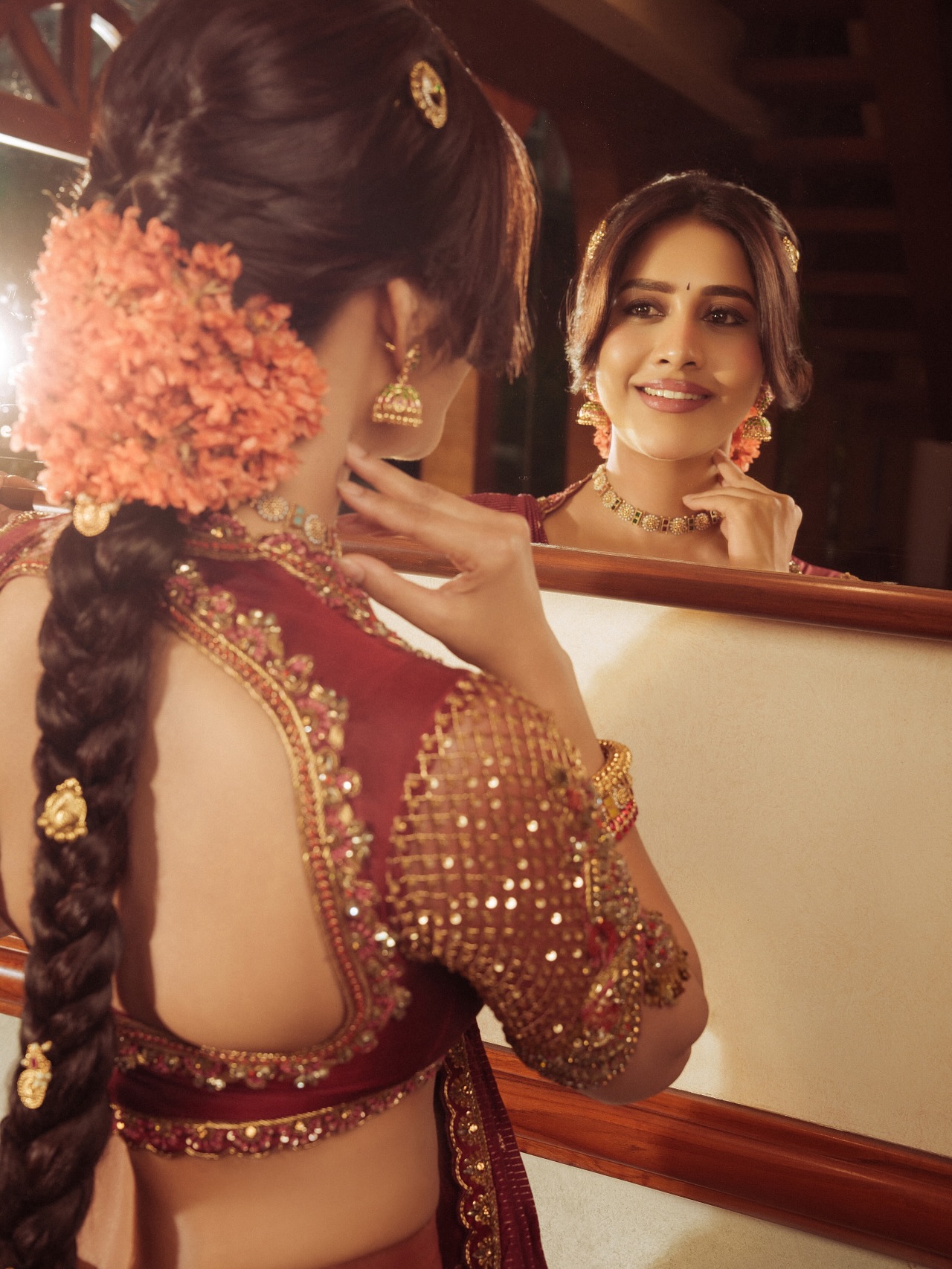 Nabha Natesh’s Regal Ethnic Glow: Mastering Festive Style with Maroon Elegance
