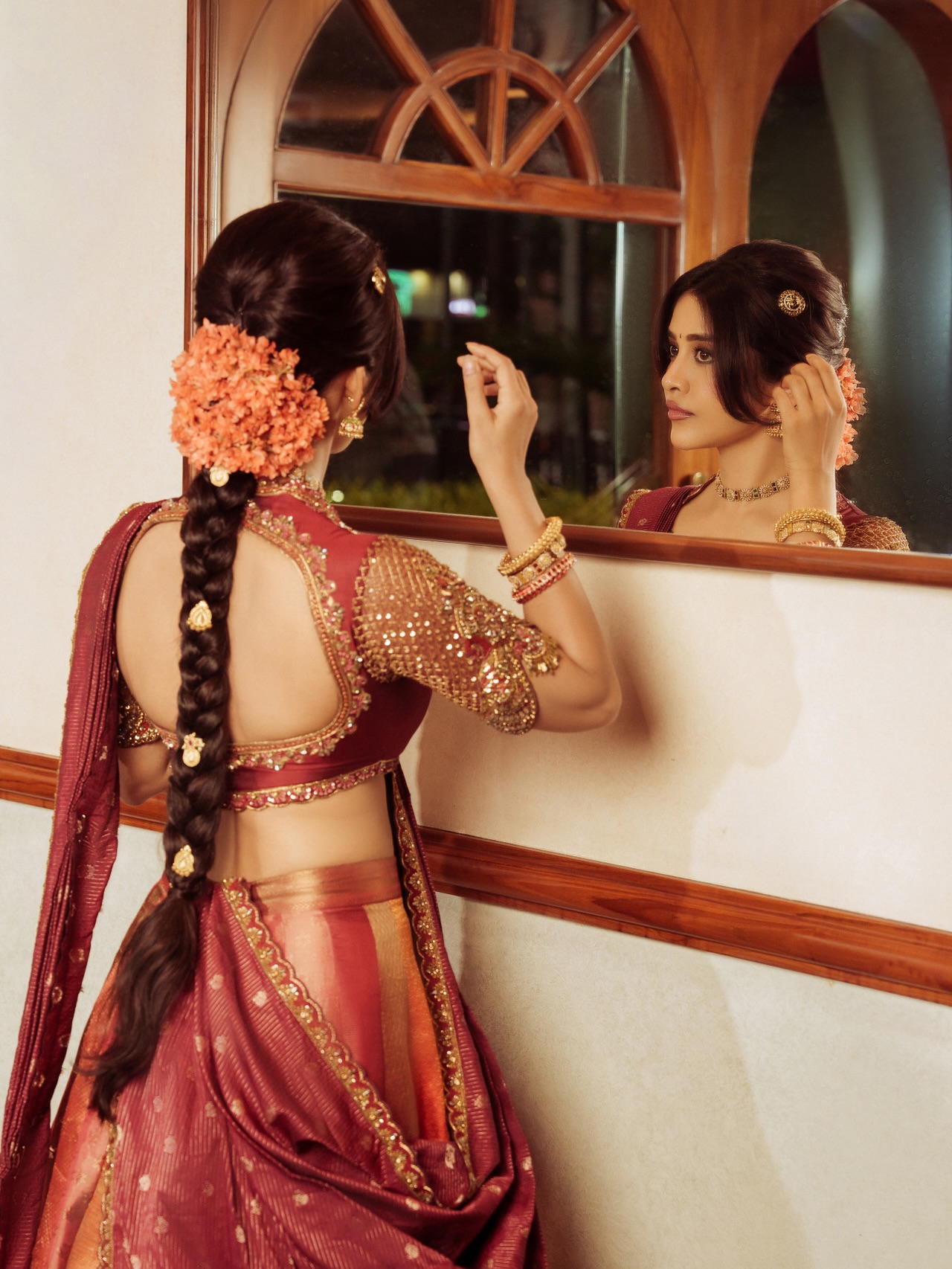 Nabha Natesh’s Regal Ethnic Glow: Mastering Festive Style with Maroon Elegance