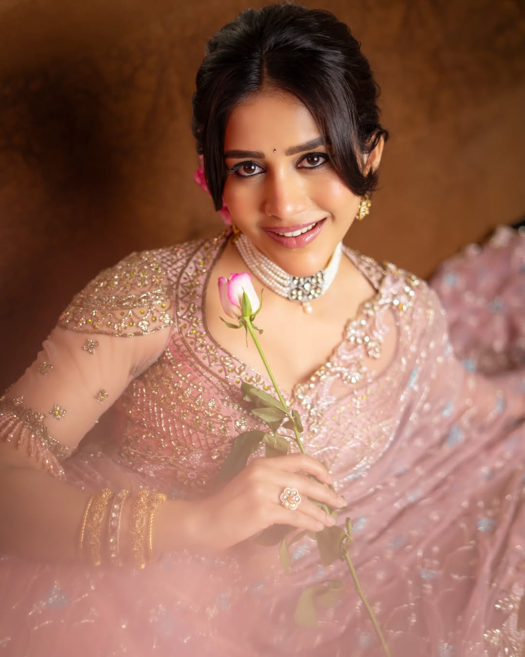 Nabha Natesh is seen wearing a deep blue kurta with embroidery and black trousers.