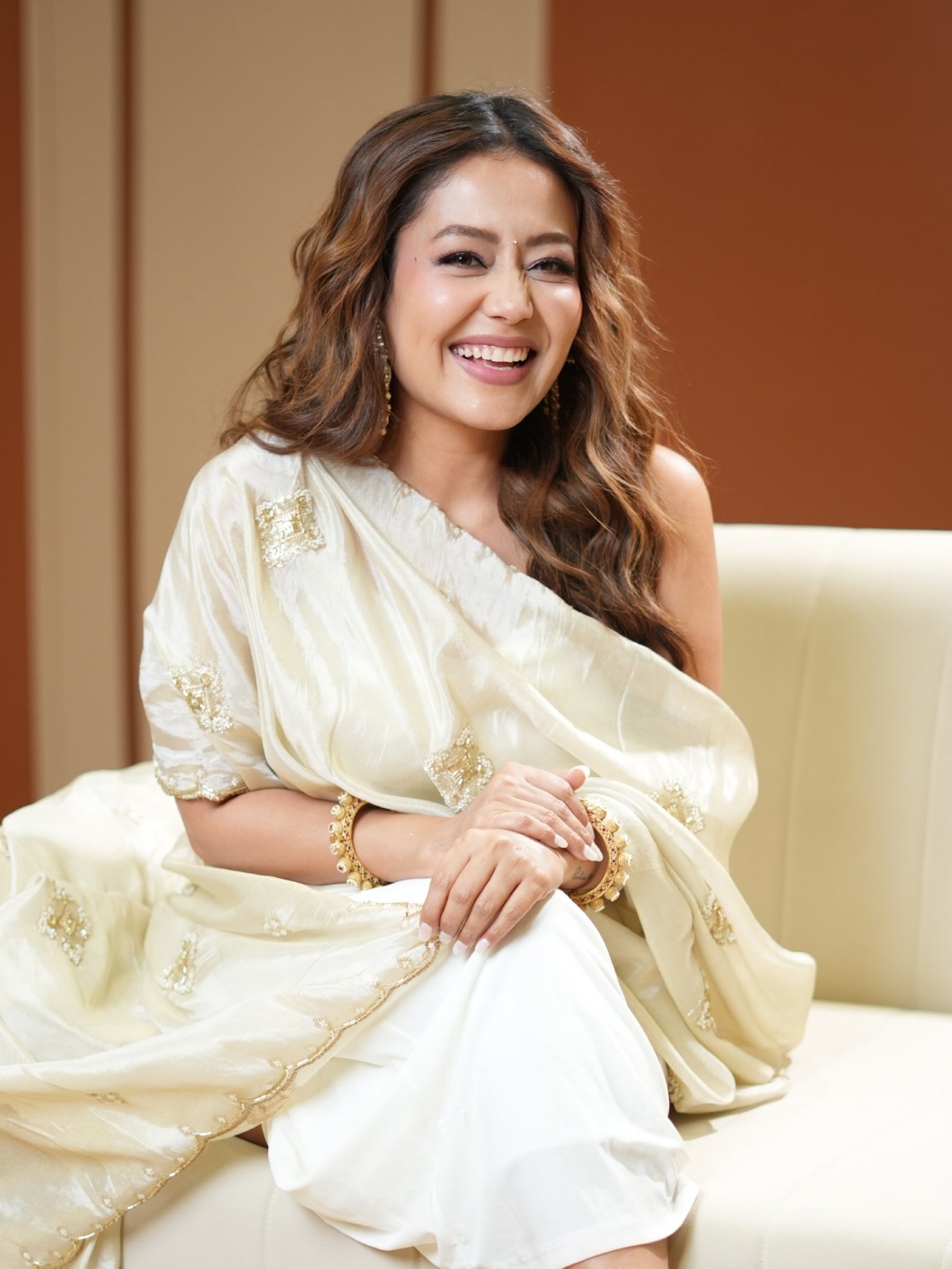 Neha Kakkar's Effortless Glamour: Blending Tradition with Modern Edge