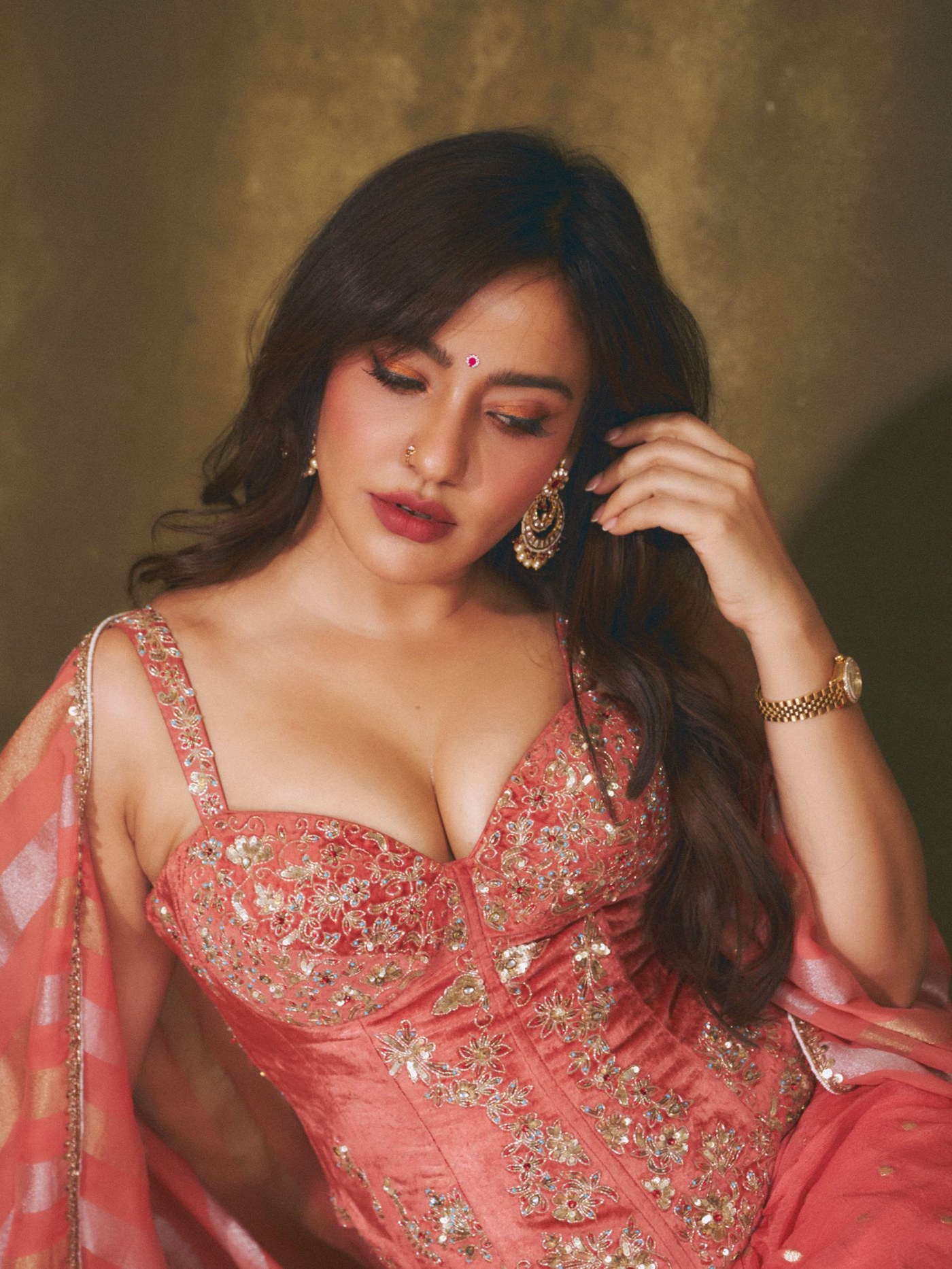 Neha Sharma Masters Festive Fashion with Coral and Gold Stripes