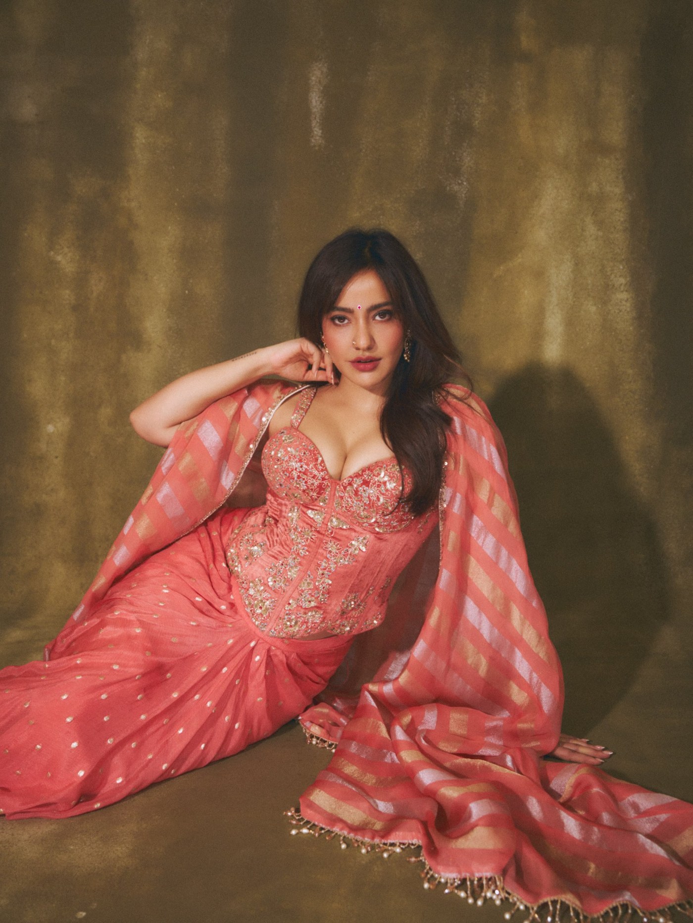 Neha Sharma Masters Festive Fashion with Coral and Gold Stripes
